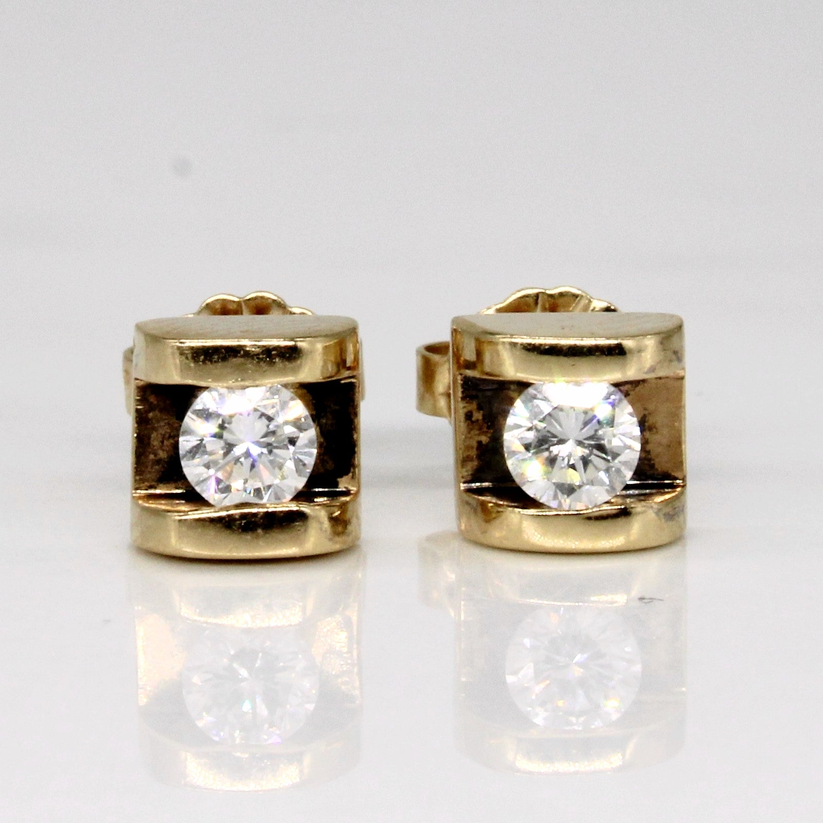 Boucles d'oreilles puces en or jaune 14 carats et diamants | 0,30 ct au total |