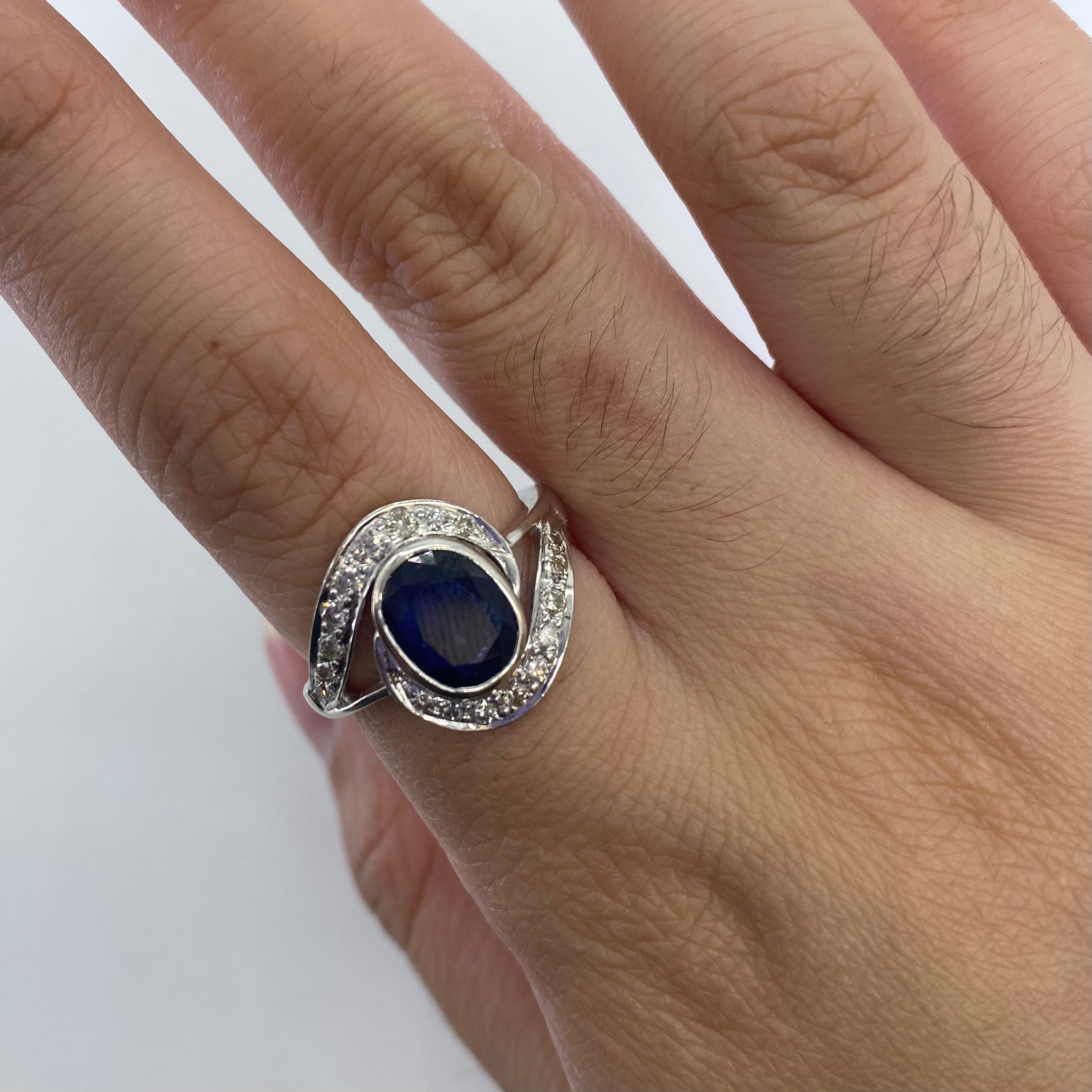 T.K. Anderson's Sapphire and Diamond Bypass Ring | 1.60 ct Sapphire, 0.38ctw DIamonds SZ 7 |