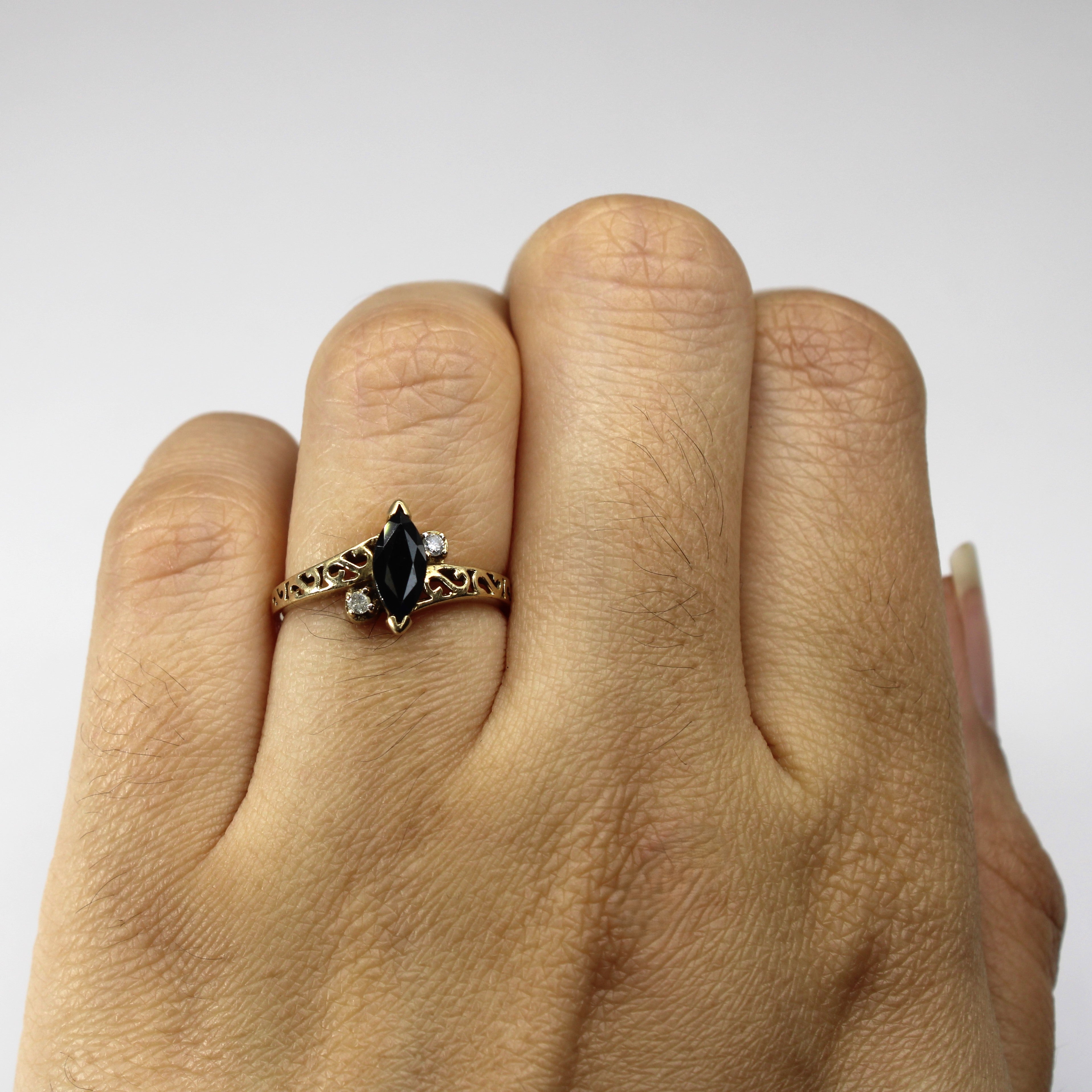 Bypass Sapphire & Diamond Ring | 0.60ct | 0.04ctw | SZ 5.25 |