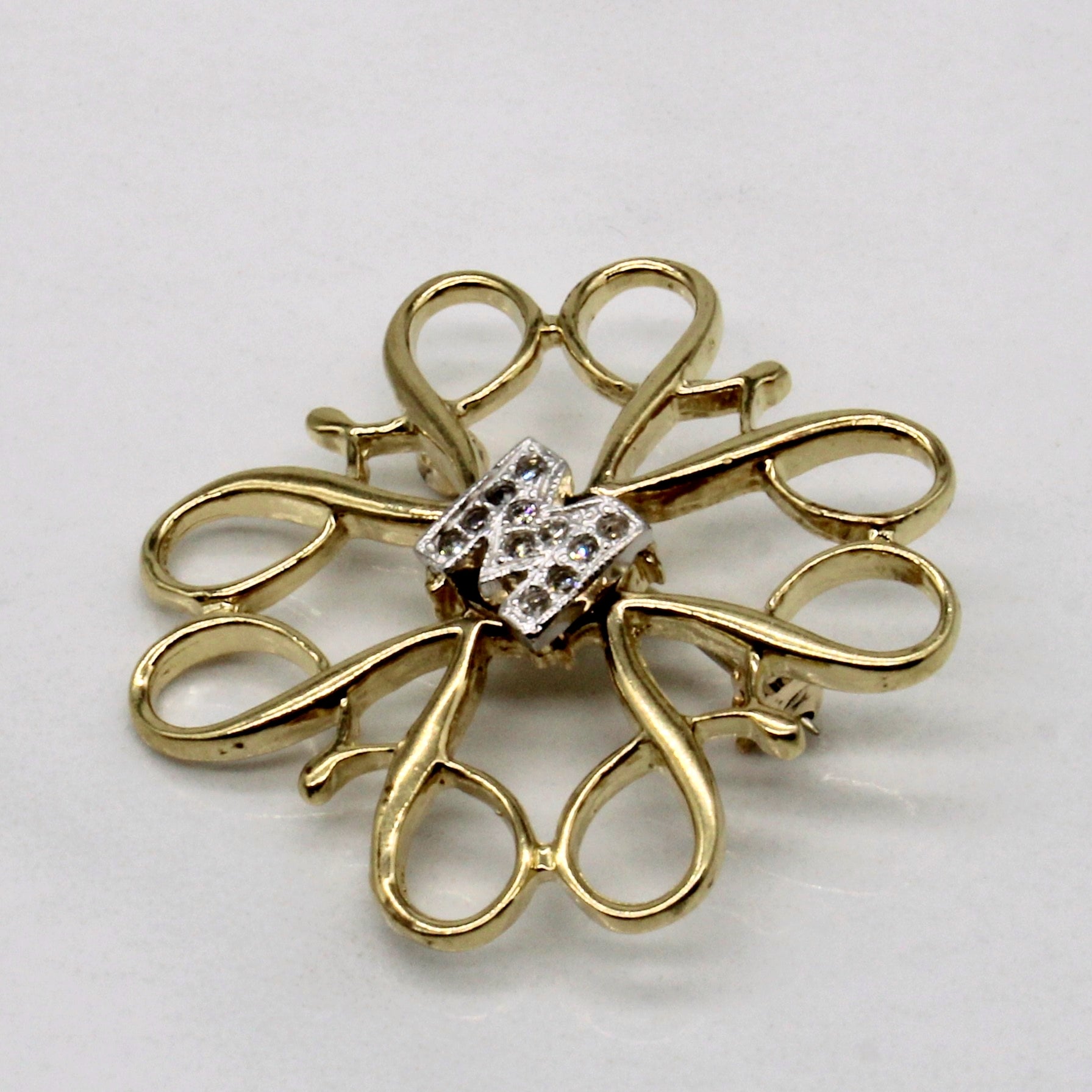 Diamond 'M' Brooch | 0.06ctw |