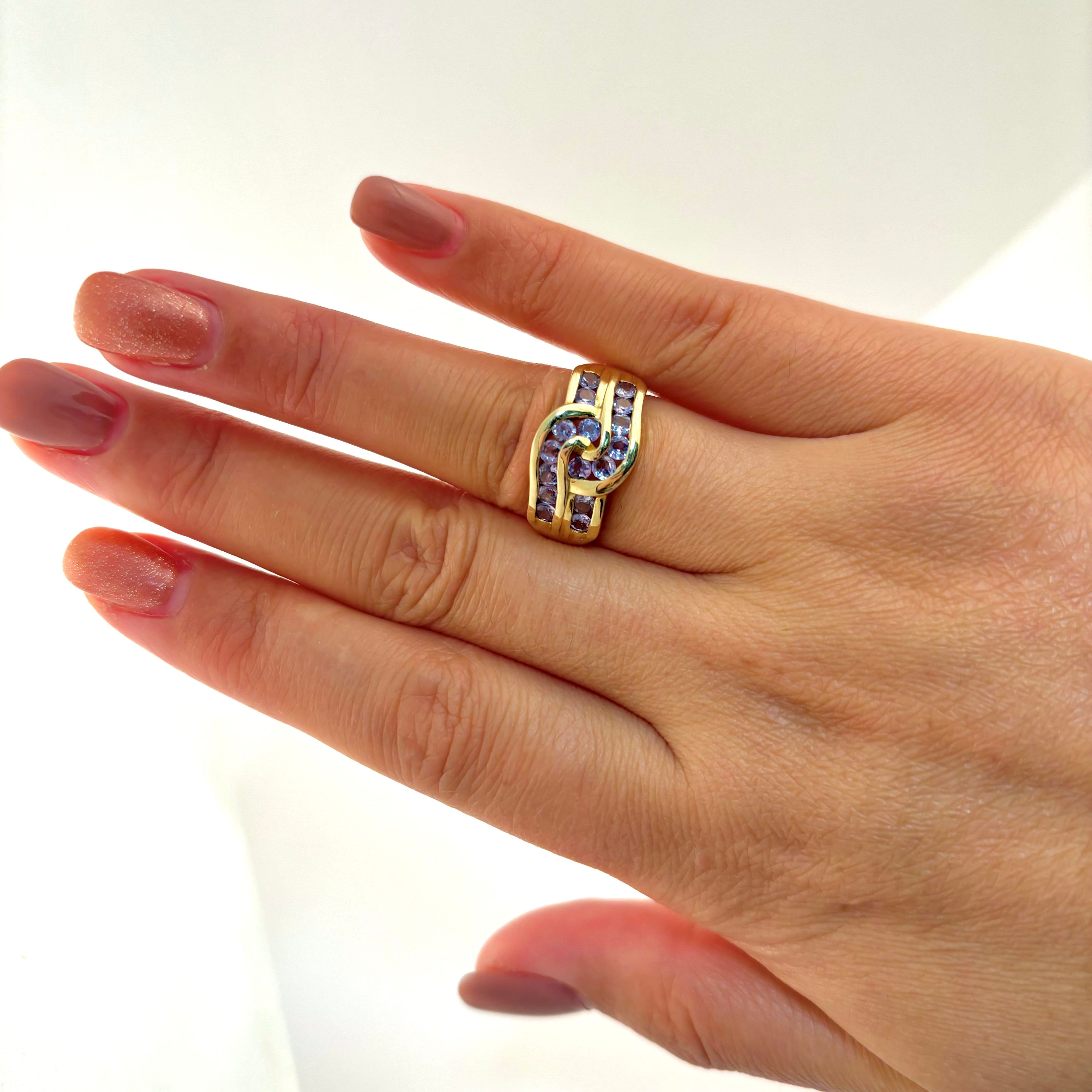 Bague en or jaune 14 carats avec tanzanite à motif tourbillonnant | 1,05 ct | Taille 6