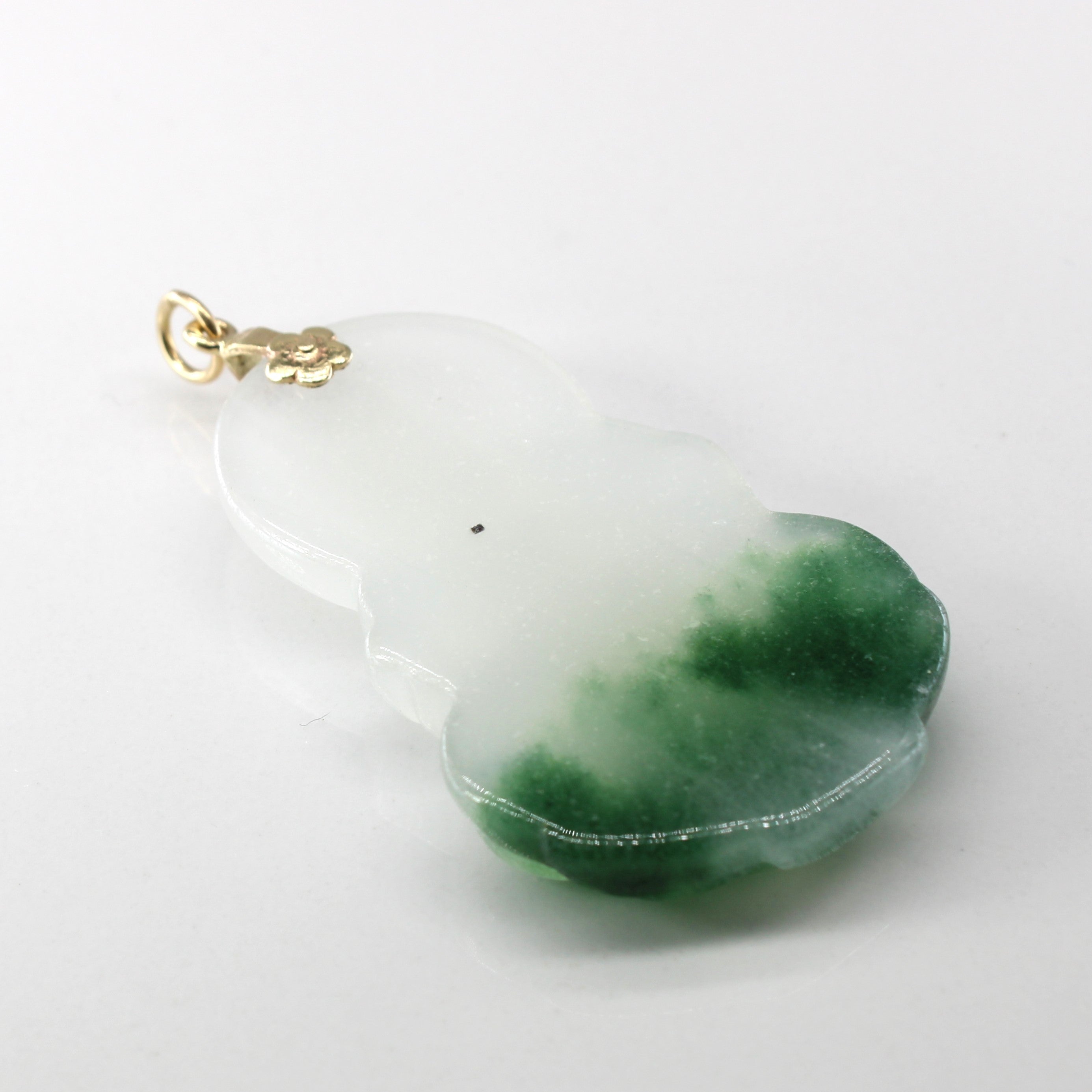 Carved Jadeite Pendant | 74.00ct |