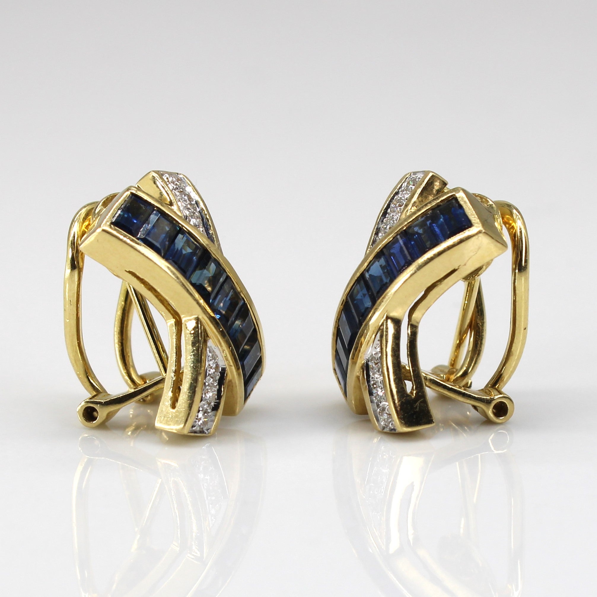 Boucles d'oreilles croisées saphir et diamants | 1,40 ct | 0,18 ct |