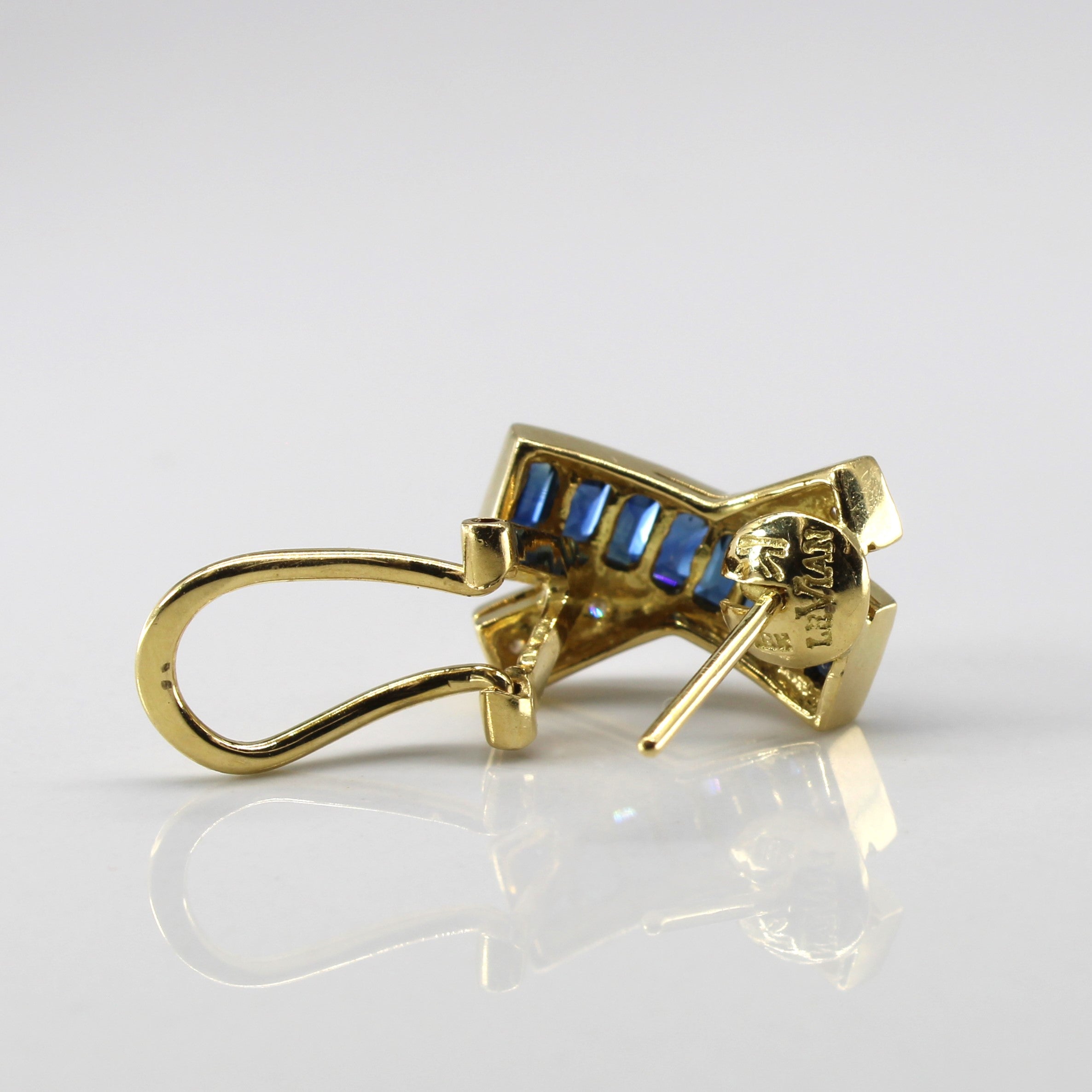 Boucles d'oreilles croisées saphir et diamants | 1,40 ct | 0,18 ct |