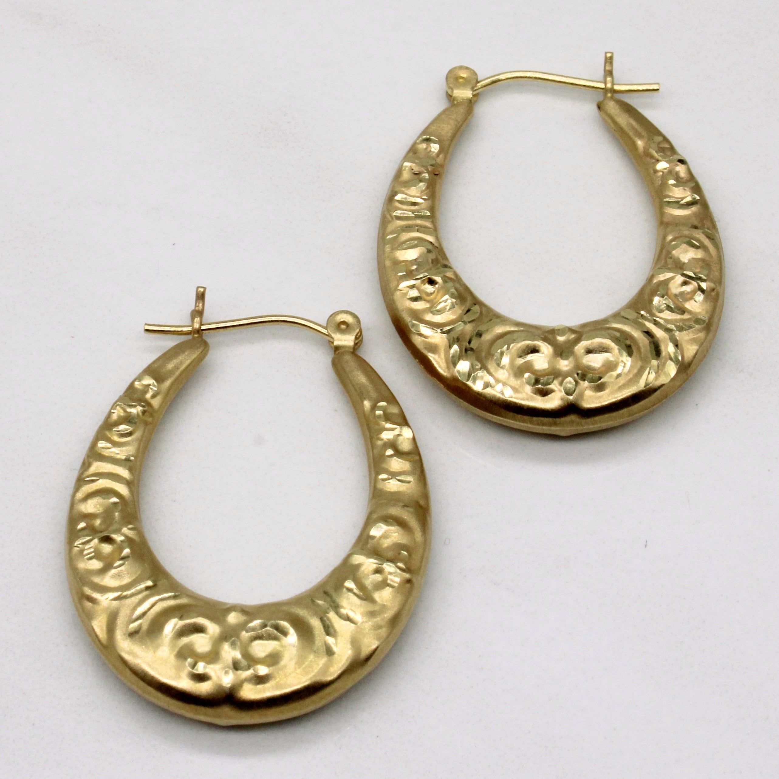 Boucles d'oreilles créoles en or jaune 14 carats