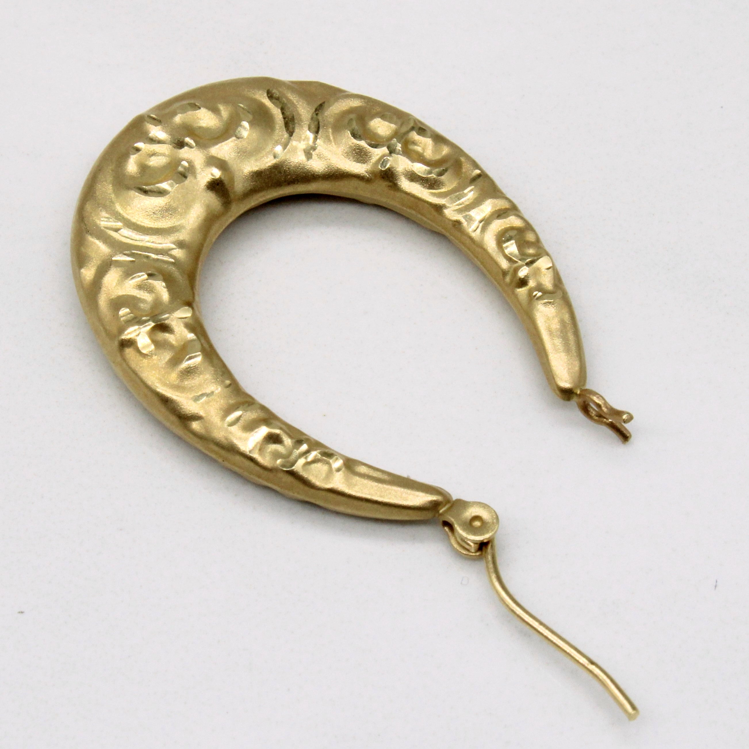 Boucles d'oreilles créoles en or jaune 14 carats