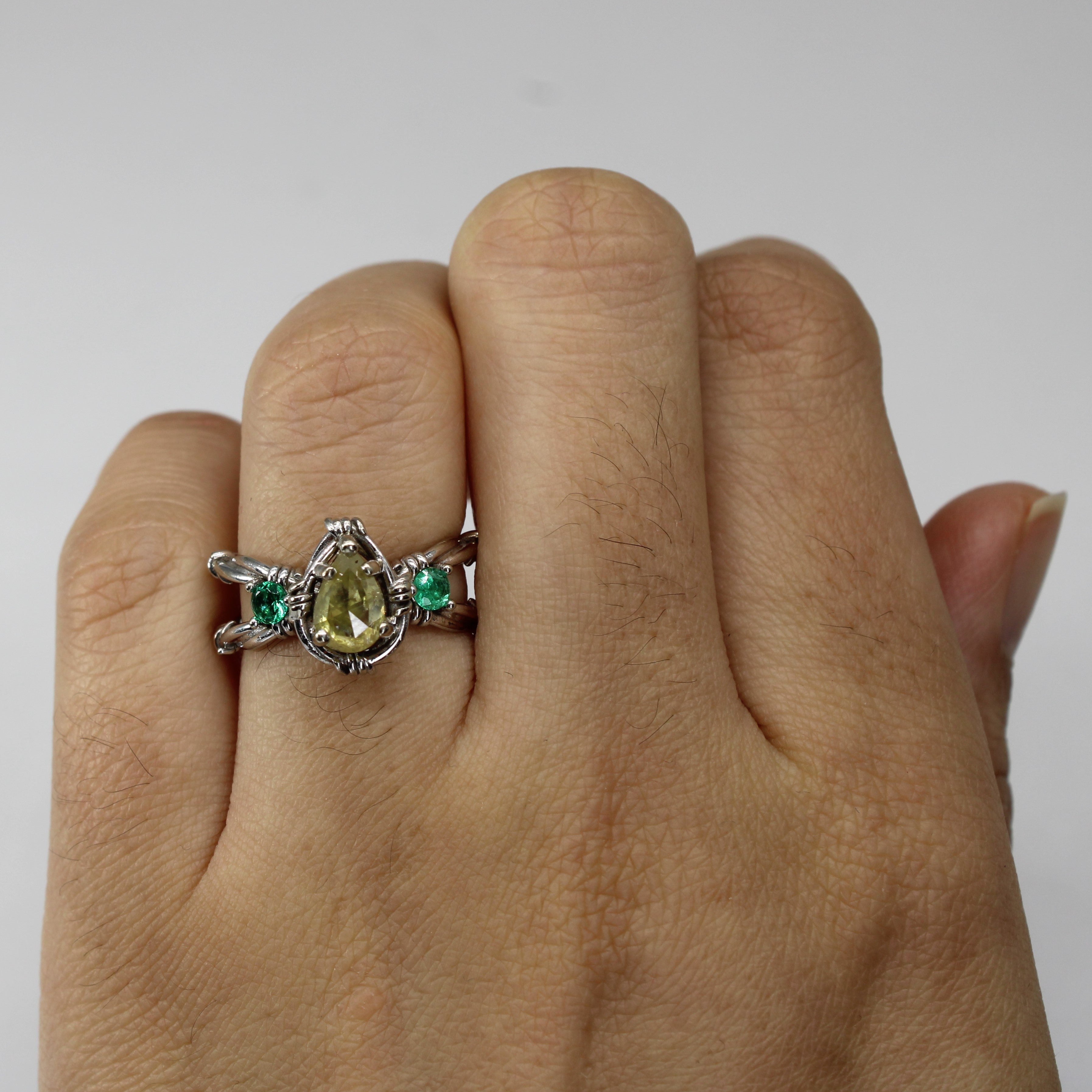 Crossover Three Stone Ring | 0.78ct | 0.16ctw I3 Fancy Yellow | SZ 5.5 |