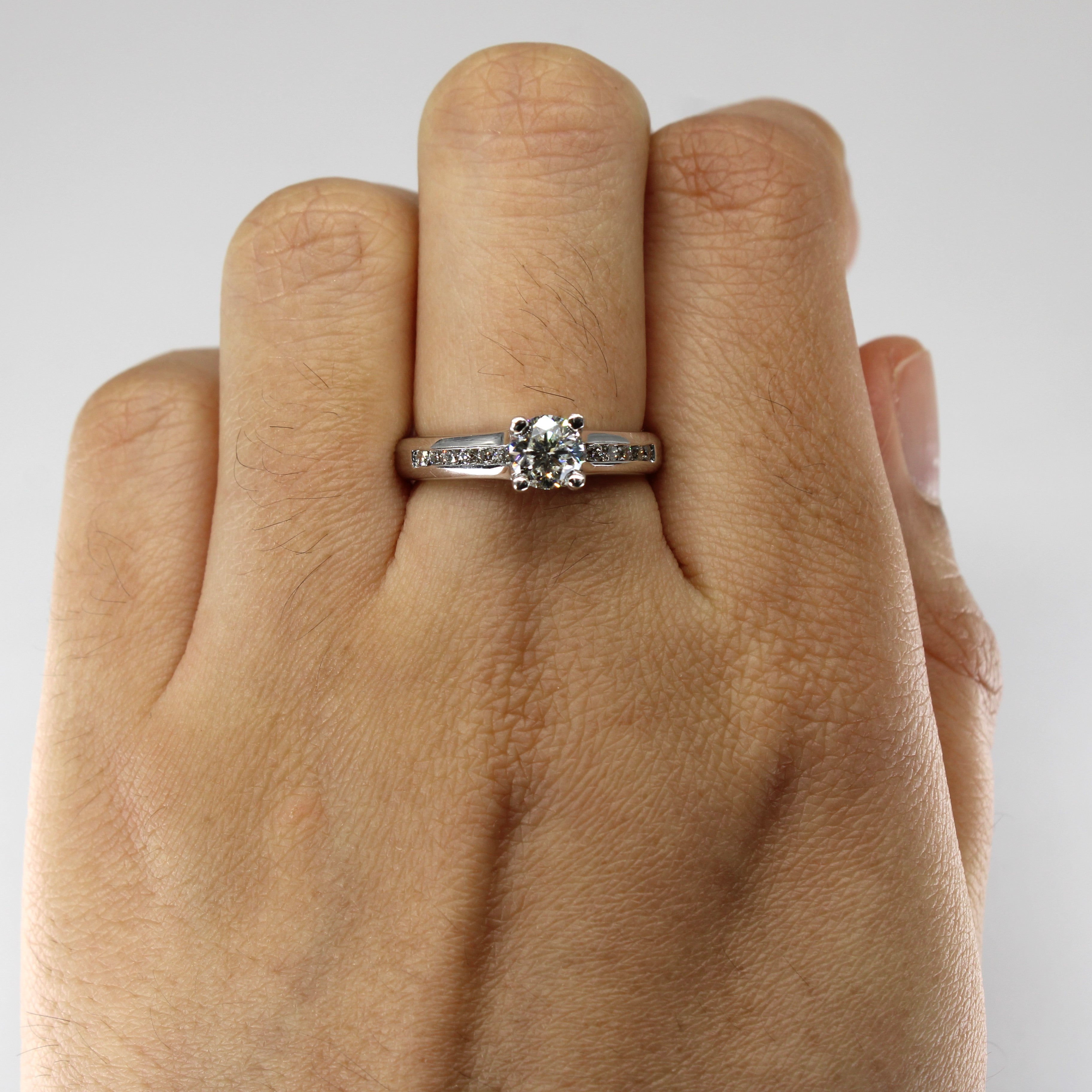 Solitaire with Accents Diamond Ring | 0.72ctw SI1 F/G | SZ 6.5 |