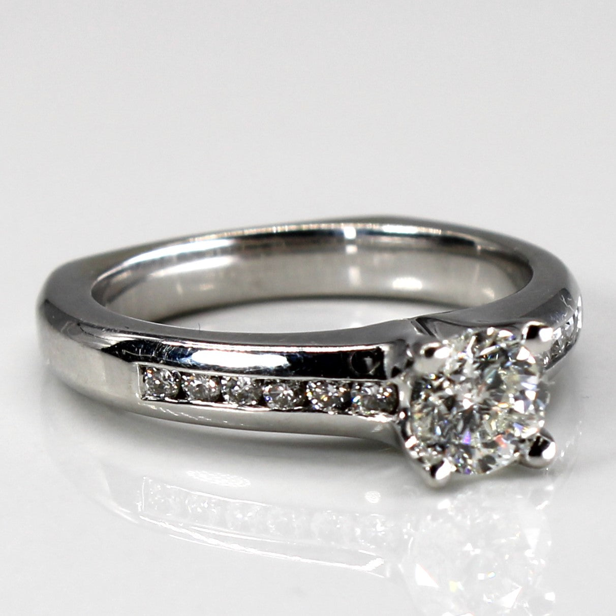 Solitaire with Accents Diamond Ring | 0.72ctw SI1 F/G | SZ 6.5 |