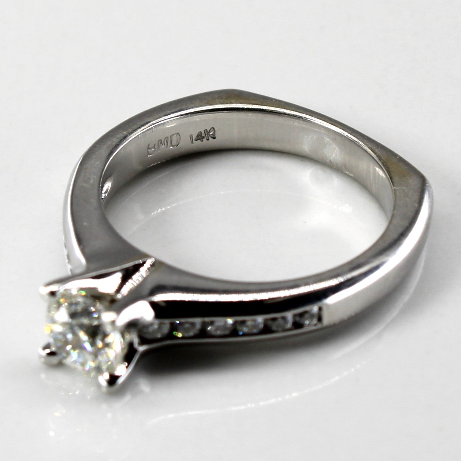 Solitaire with Accents Diamond Ring | 0.72ctw SI1 F/G | SZ 6.5 |
