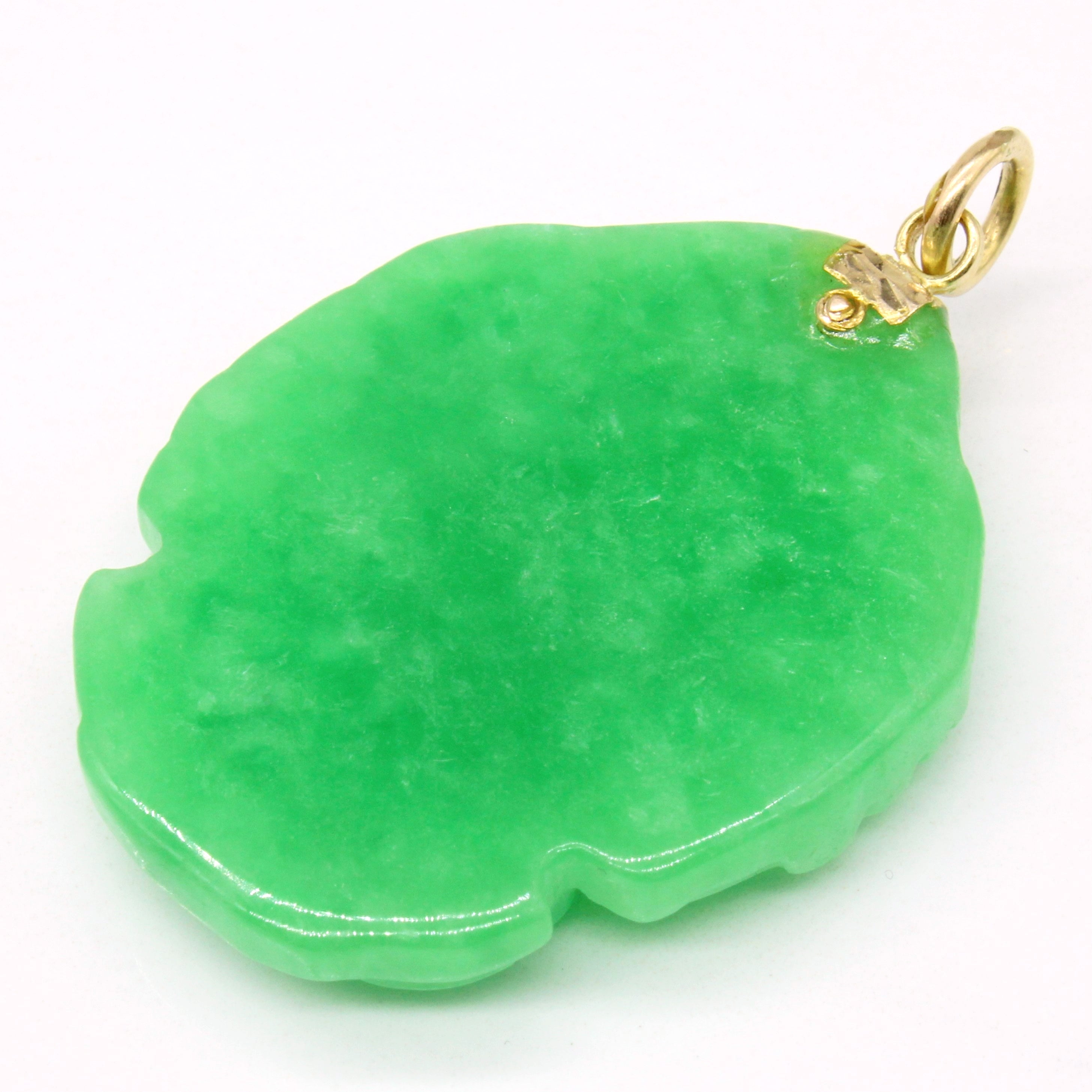 Carved Jadeite Pendant | 85.00ct |