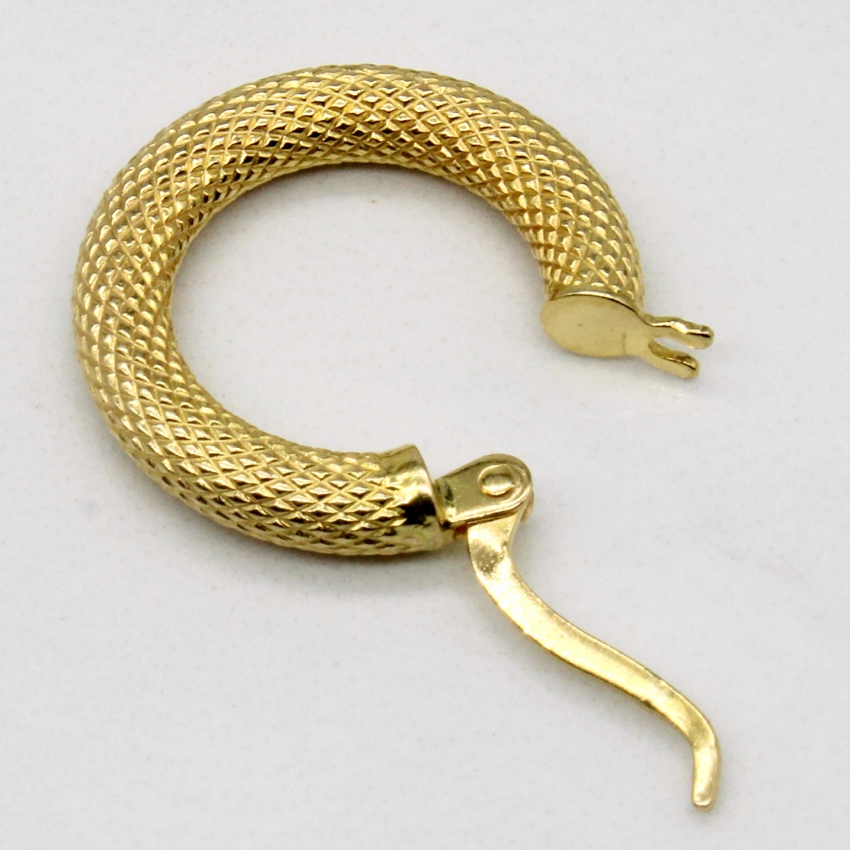 Boucles d'oreilles créoles en or jaune 18 carats