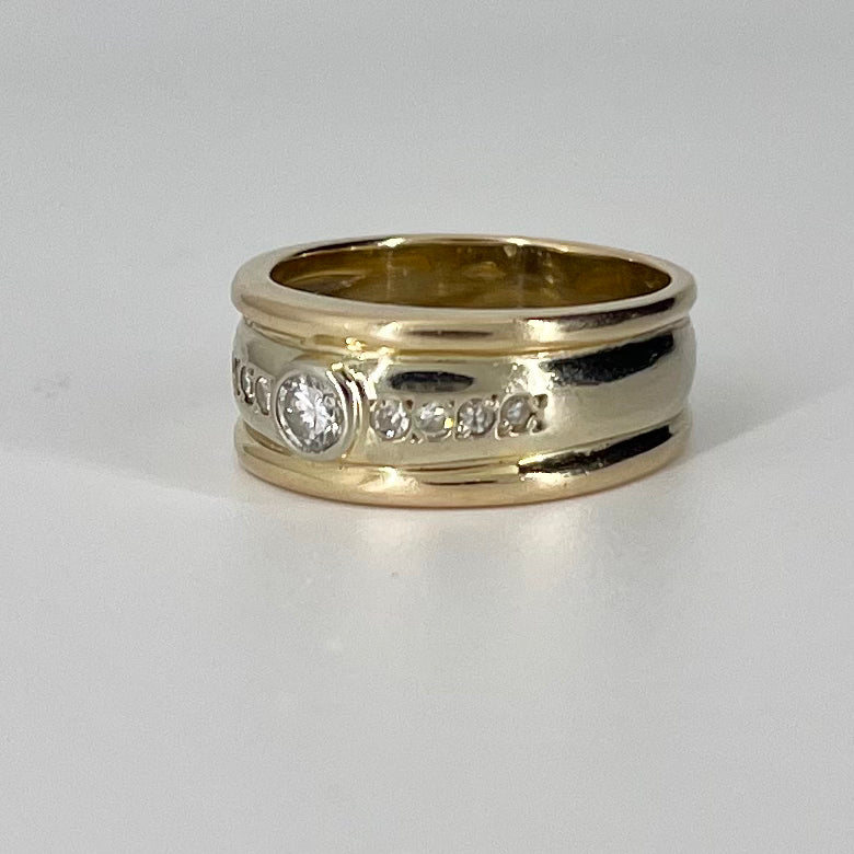Bague en or blanc et jaune sertie d'un diamant (rangée simple) | 0,37 ct | Taille 8