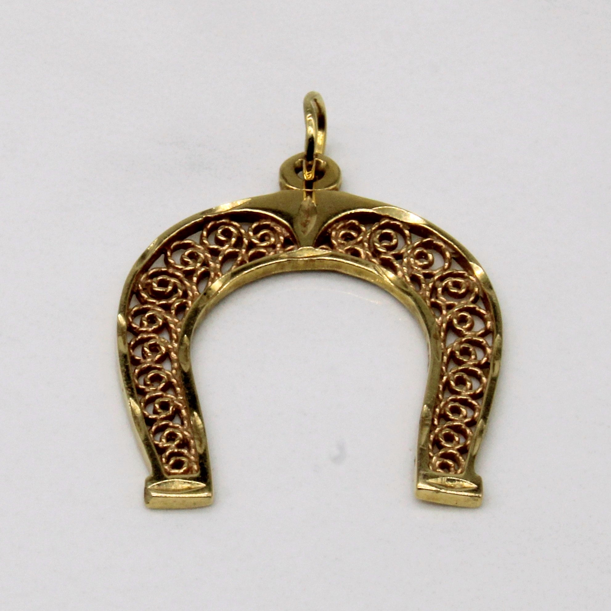 Pendentif fer à cheval orné en or jaune 14 carats