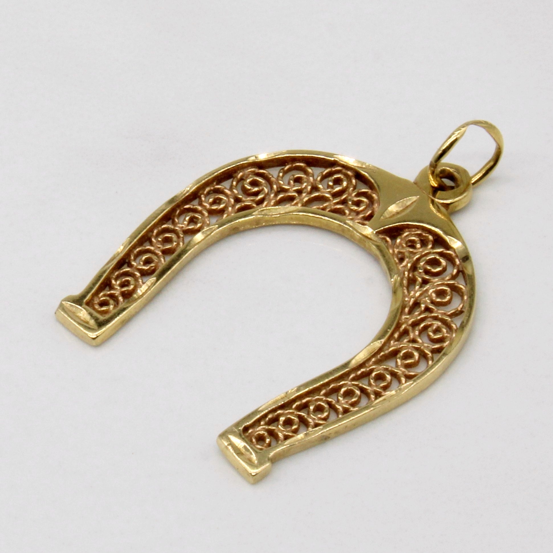 Pendentif fer à cheval orné en or jaune 14 carats