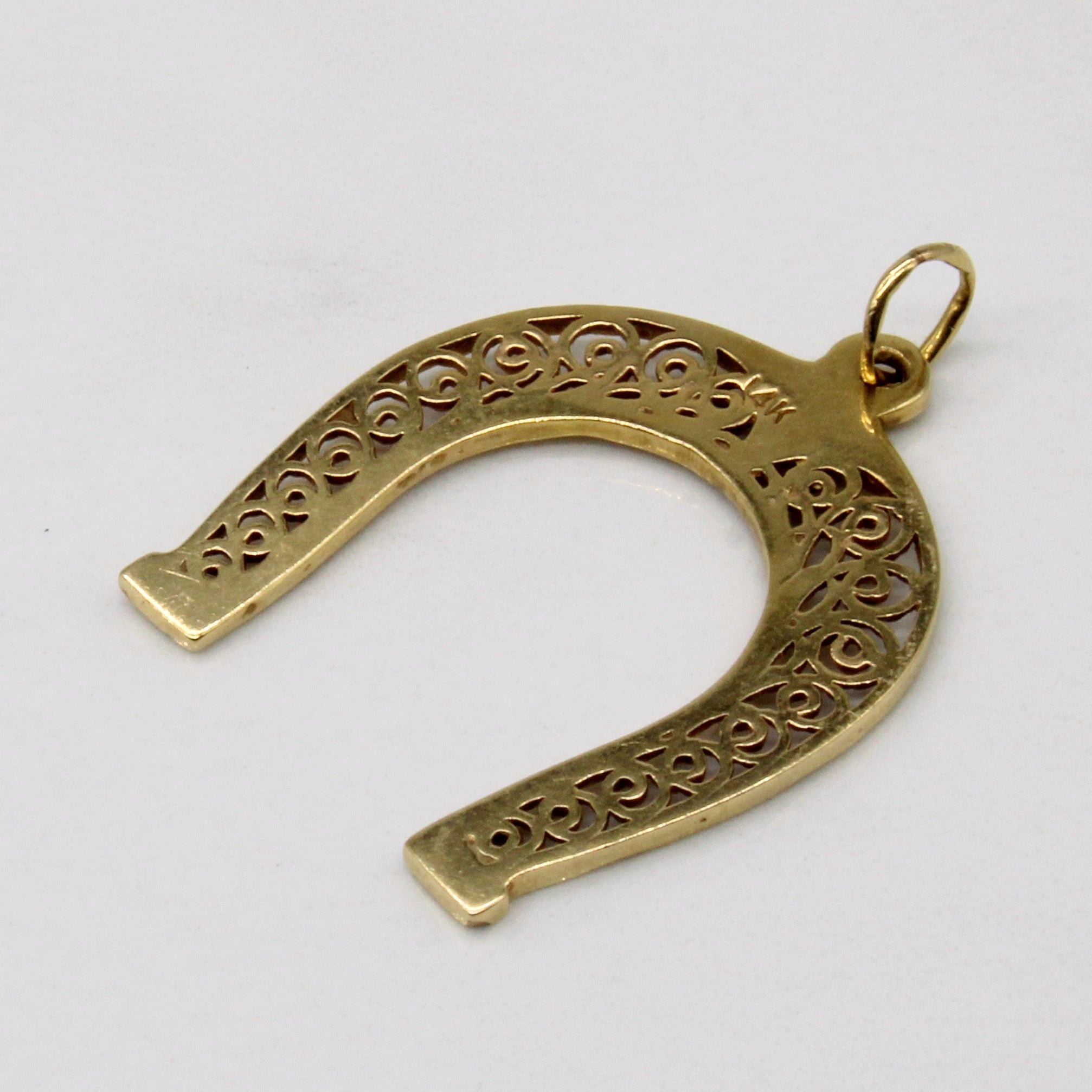 Pendentif fer à cheval orné en or jaune 14 carats