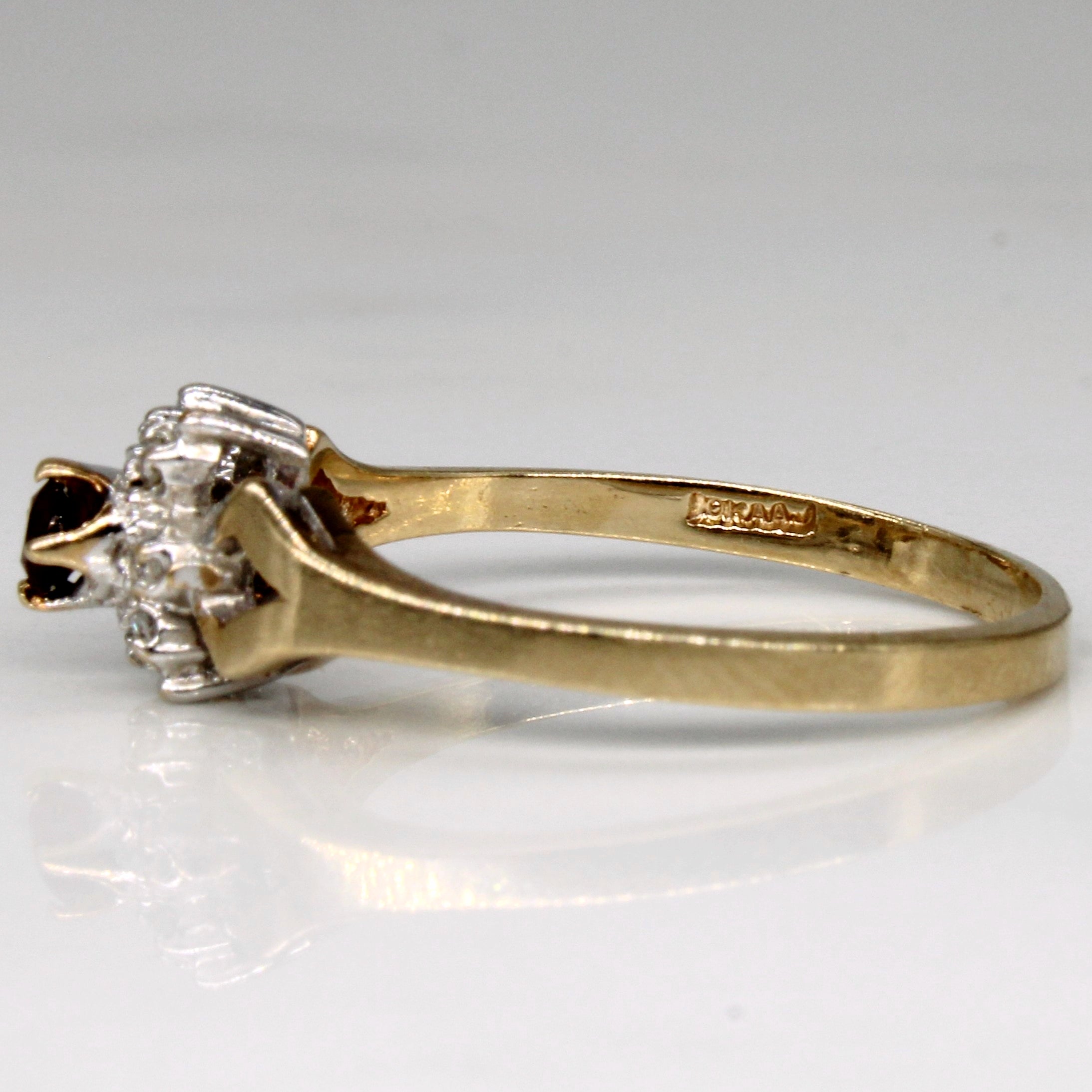 Bague sertie de grenats et de diamants | 0,09 ct, 0,03 ct au total | Taille 6,75 |