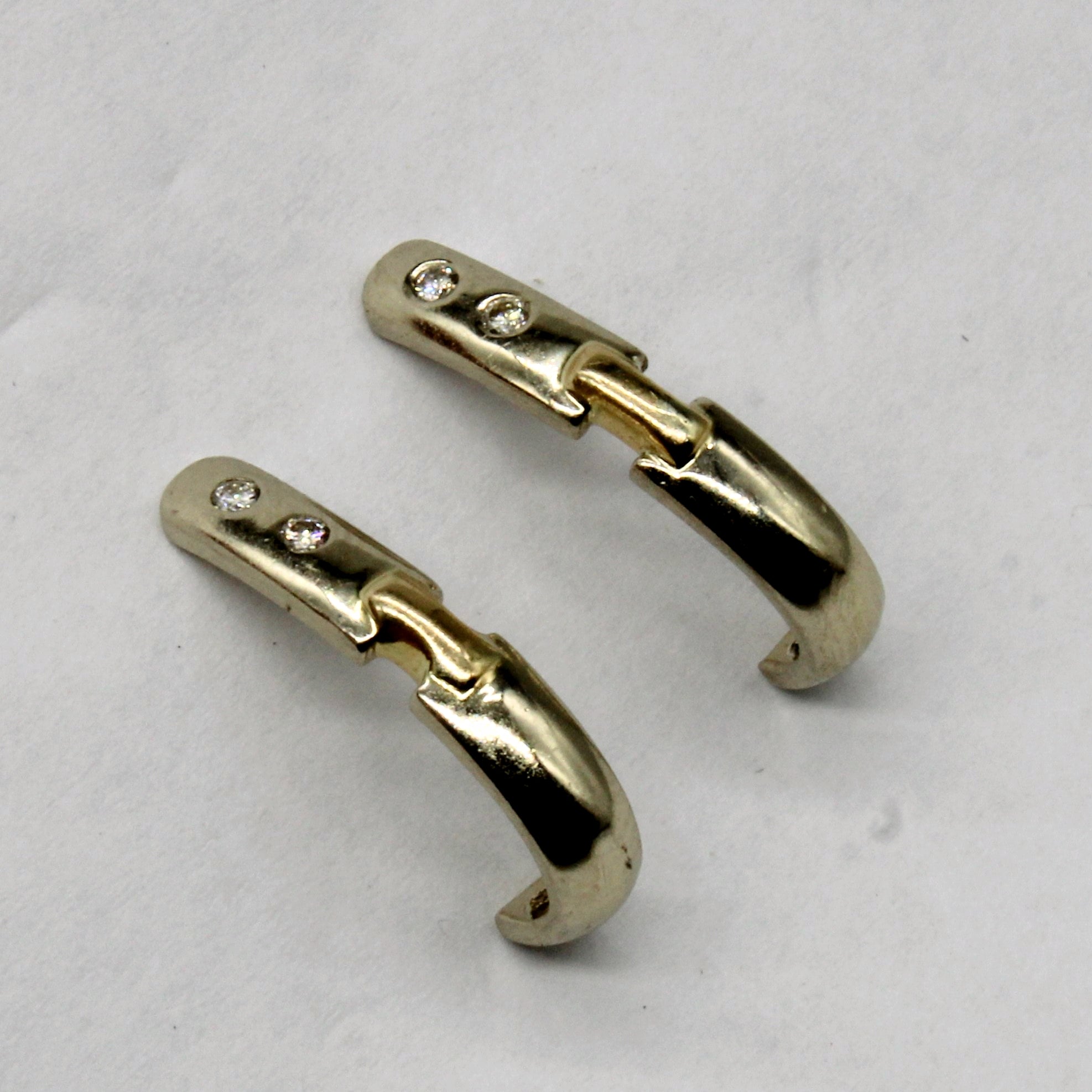 Boucles d'oreilles demi-créoles en or 14 carats serties de diamants | 0,06 ct au total |