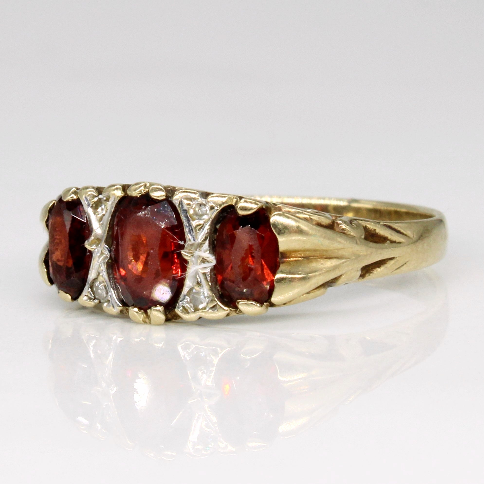Garnet & Diamond 10k Ring | 1.00ctw, 0.02ctw | SZ 6.5 |