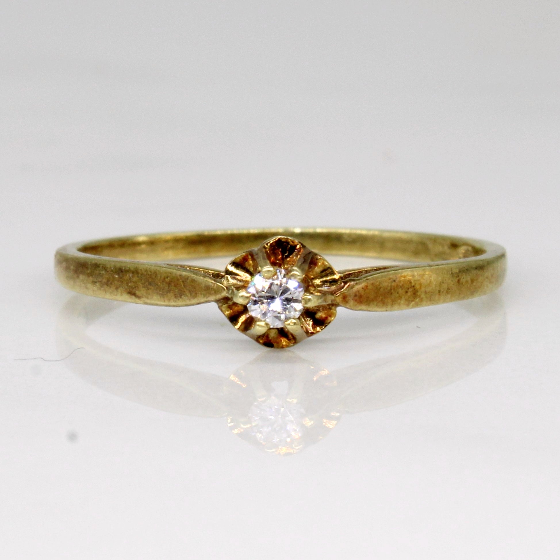 Bague Belcher sertie de diamants, poinçonnée néerlandaise, en or 14 carats | 0,05 ct | Taille 7,5 |