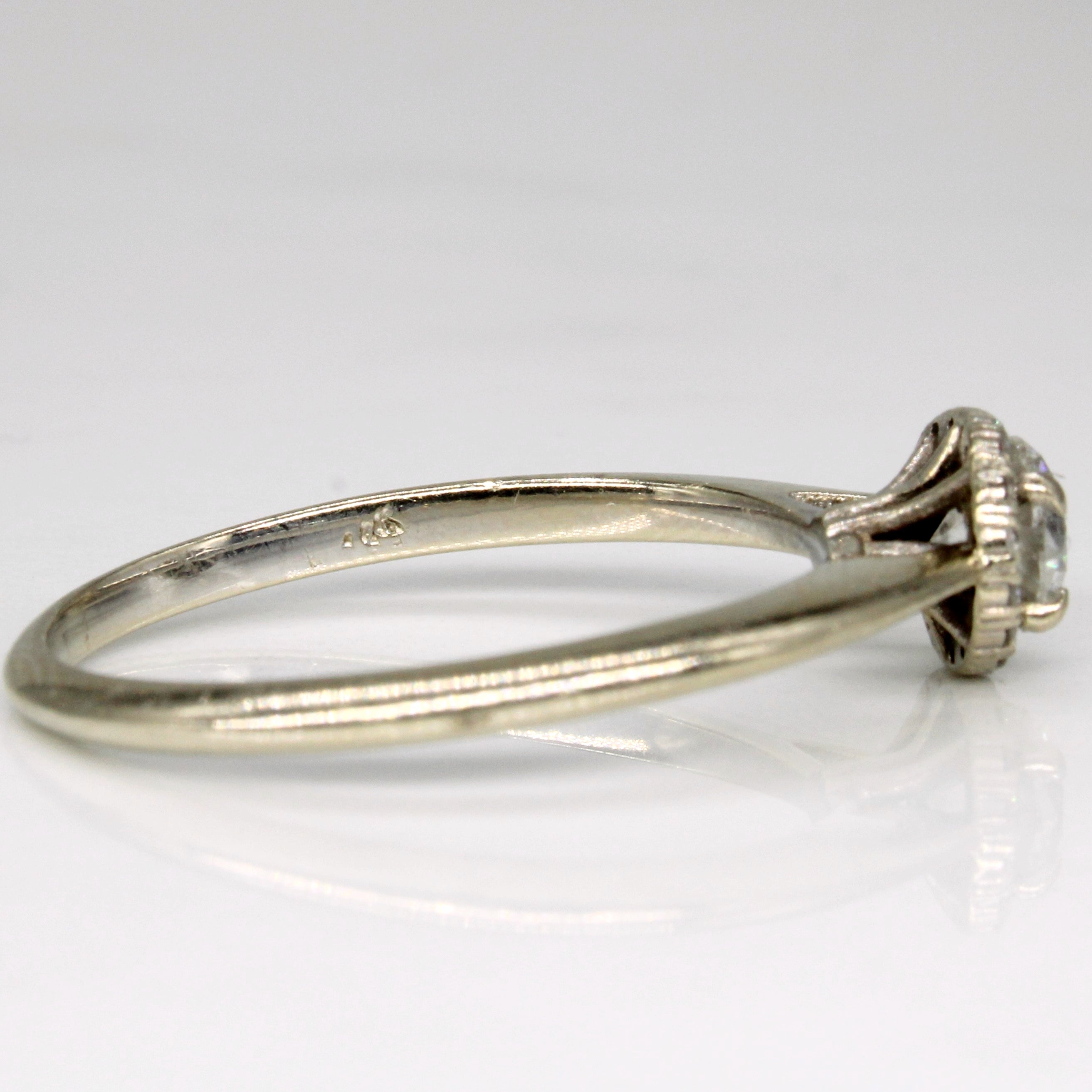 Bague halo diamant | 0,61 ct | Taille 8,75 |