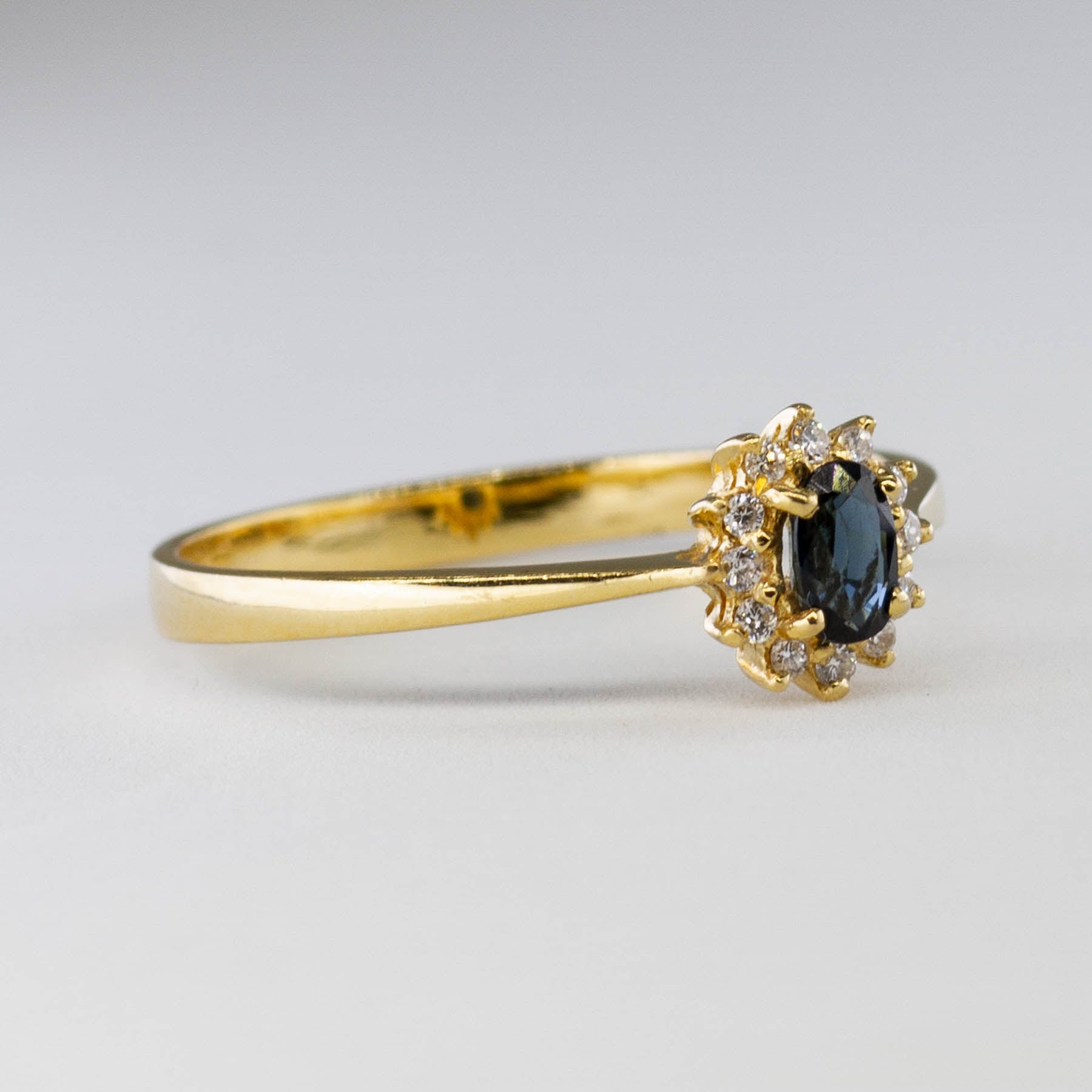 Sapphire & Diamond Halo Ring | 0.20ct, 0.06ctw | SZ 6.75 |