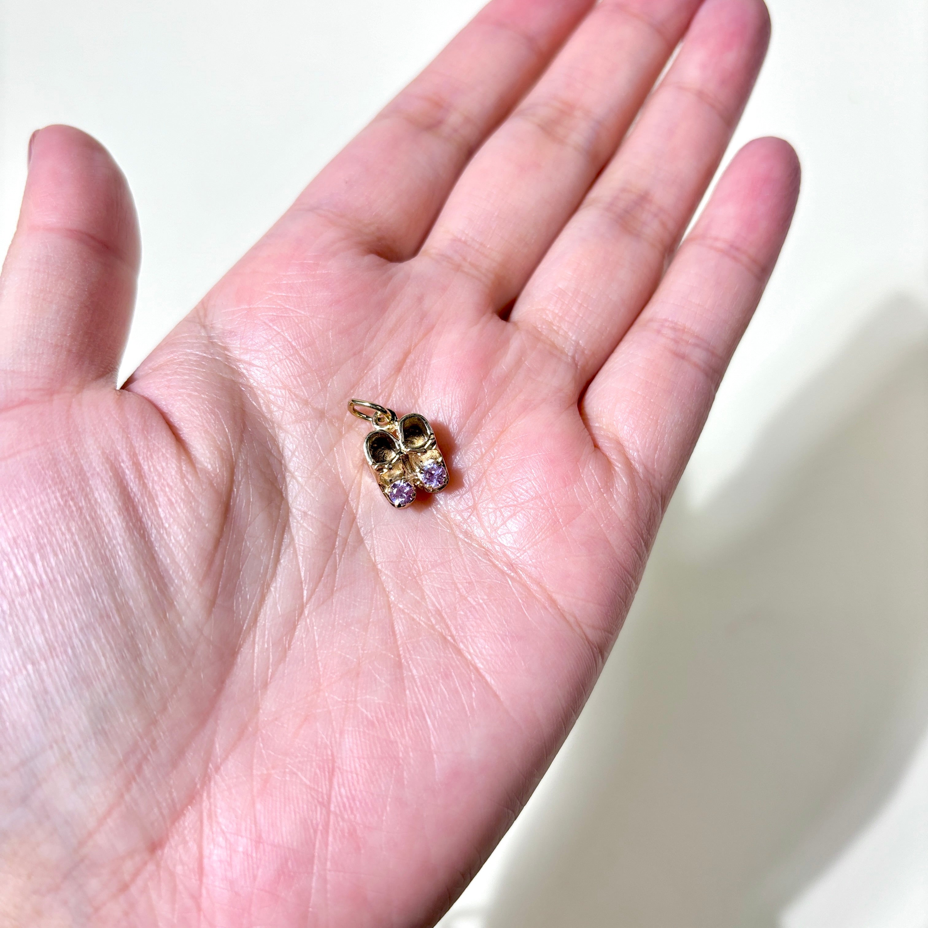 10K Yellow Gold Pink Sapphire Baby Shoes Charm | 0.20ctw |