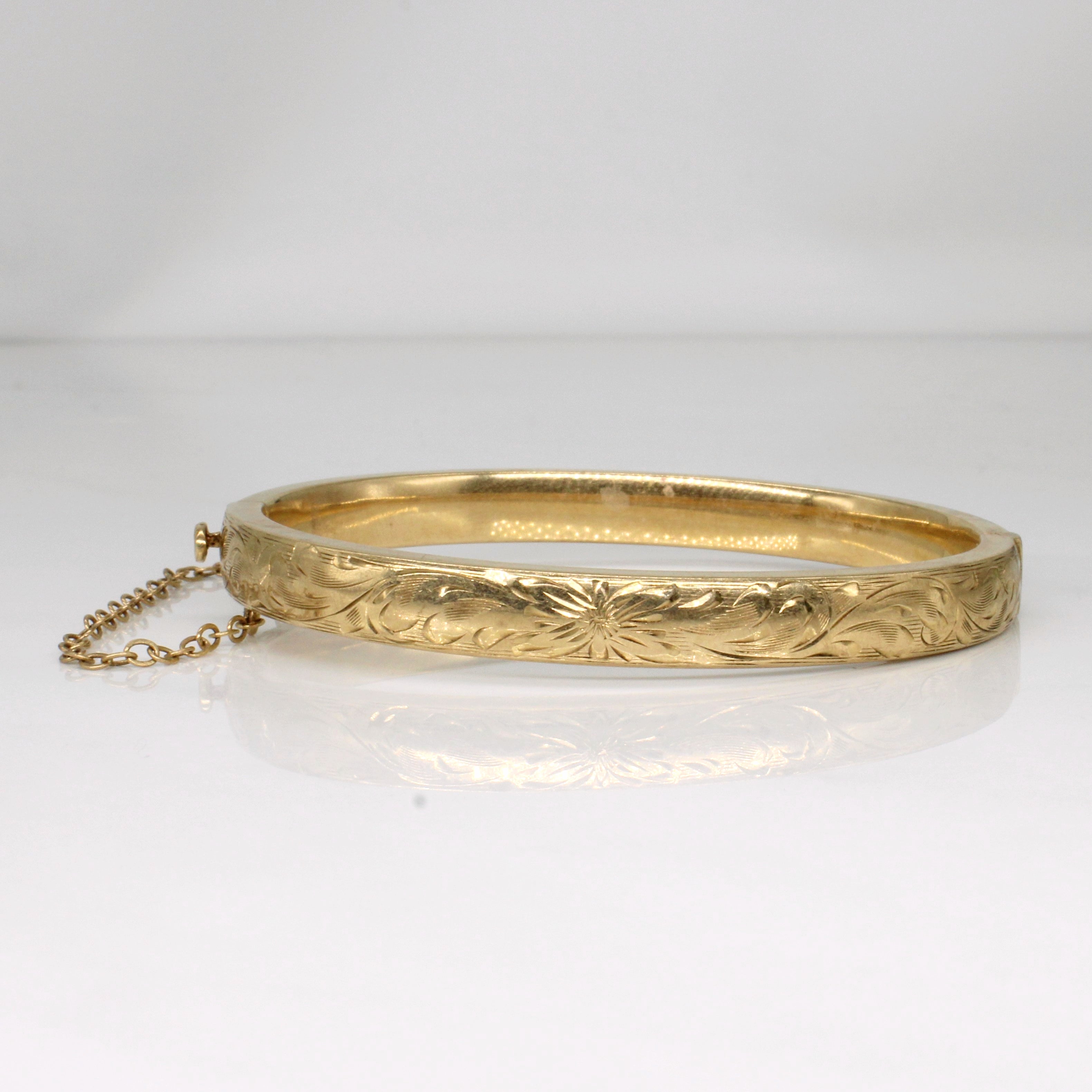 Bracelet en or jaune 10 carats gravé d'une fleur | 18 cm |