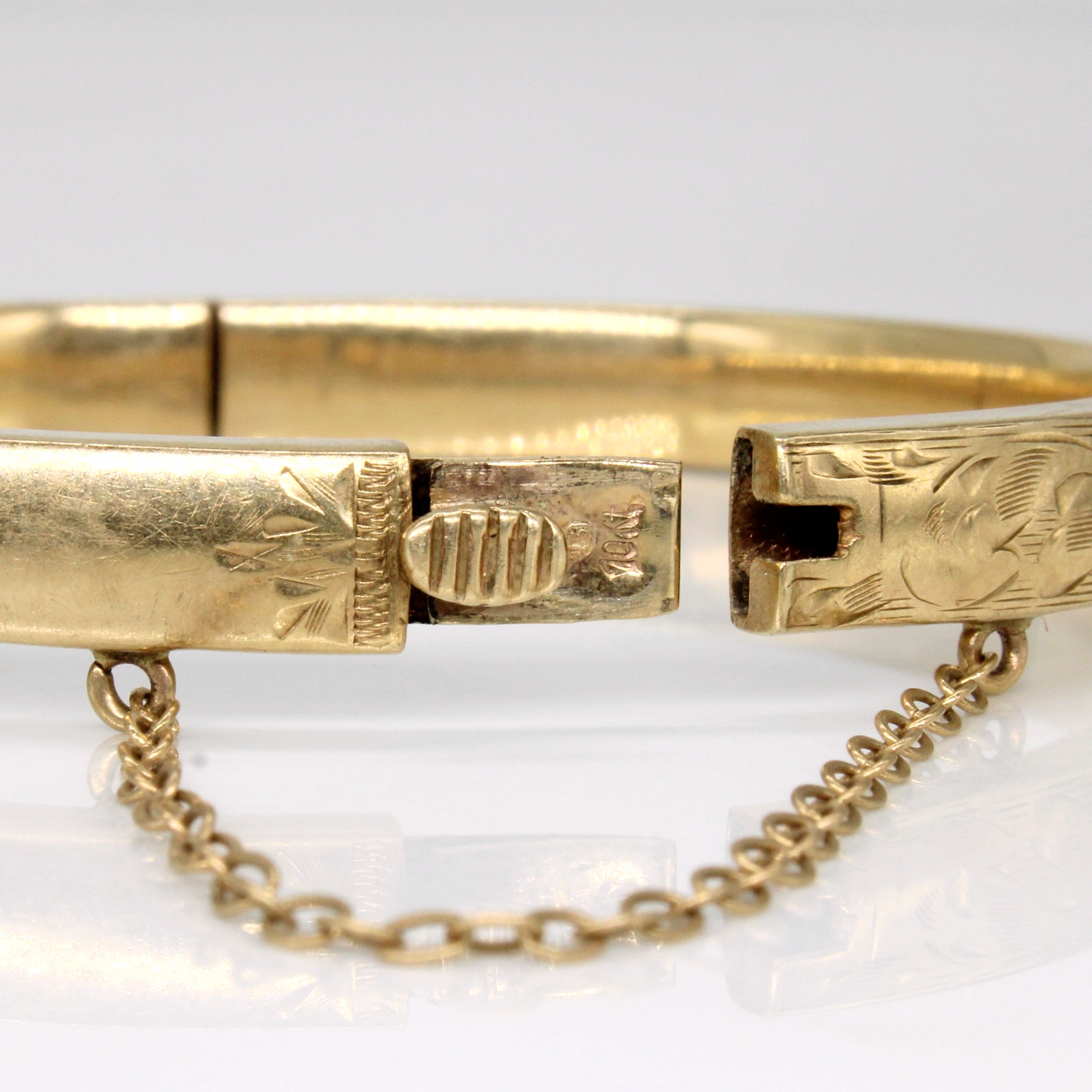 Bracelet en or jaune 10 carats gravé d'une fleur | 18 cm |