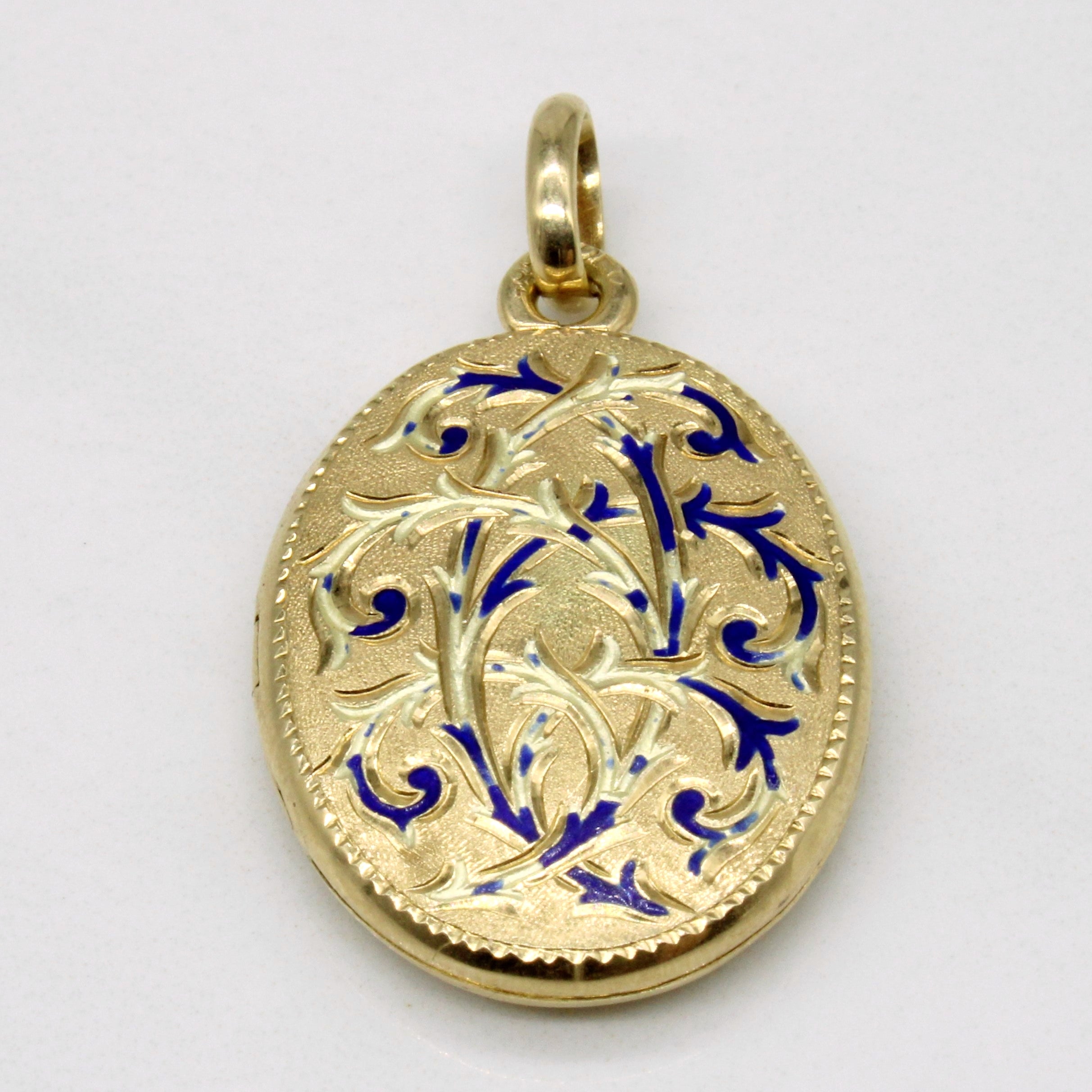 Médaillon en or jaune 14 carats et émail bleu