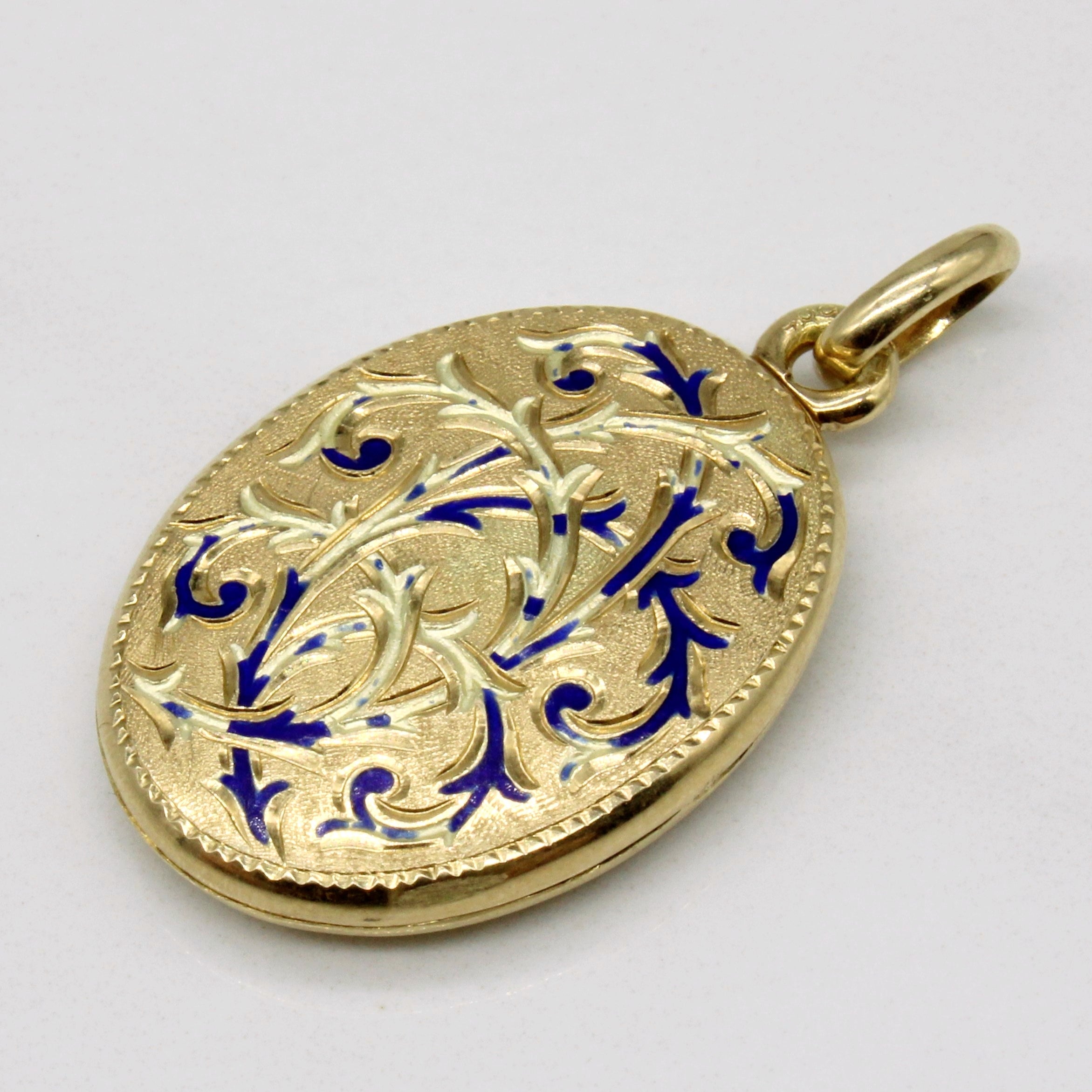 Médaillon en or jaune 14 carats et émail bleu