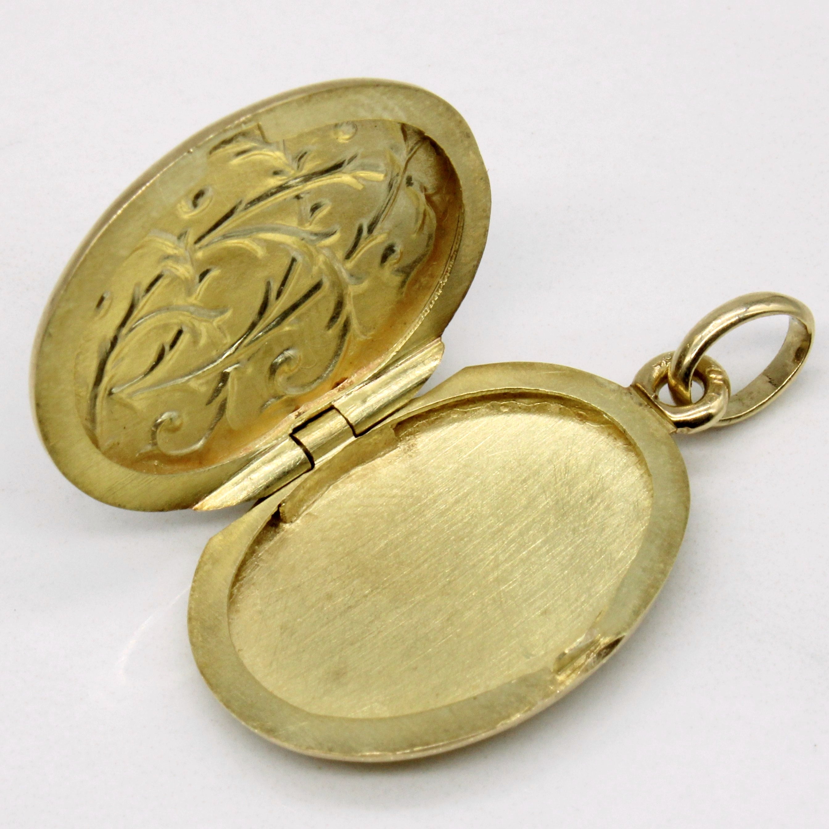 Médaillon en or jaune 14 carats et émail bleu