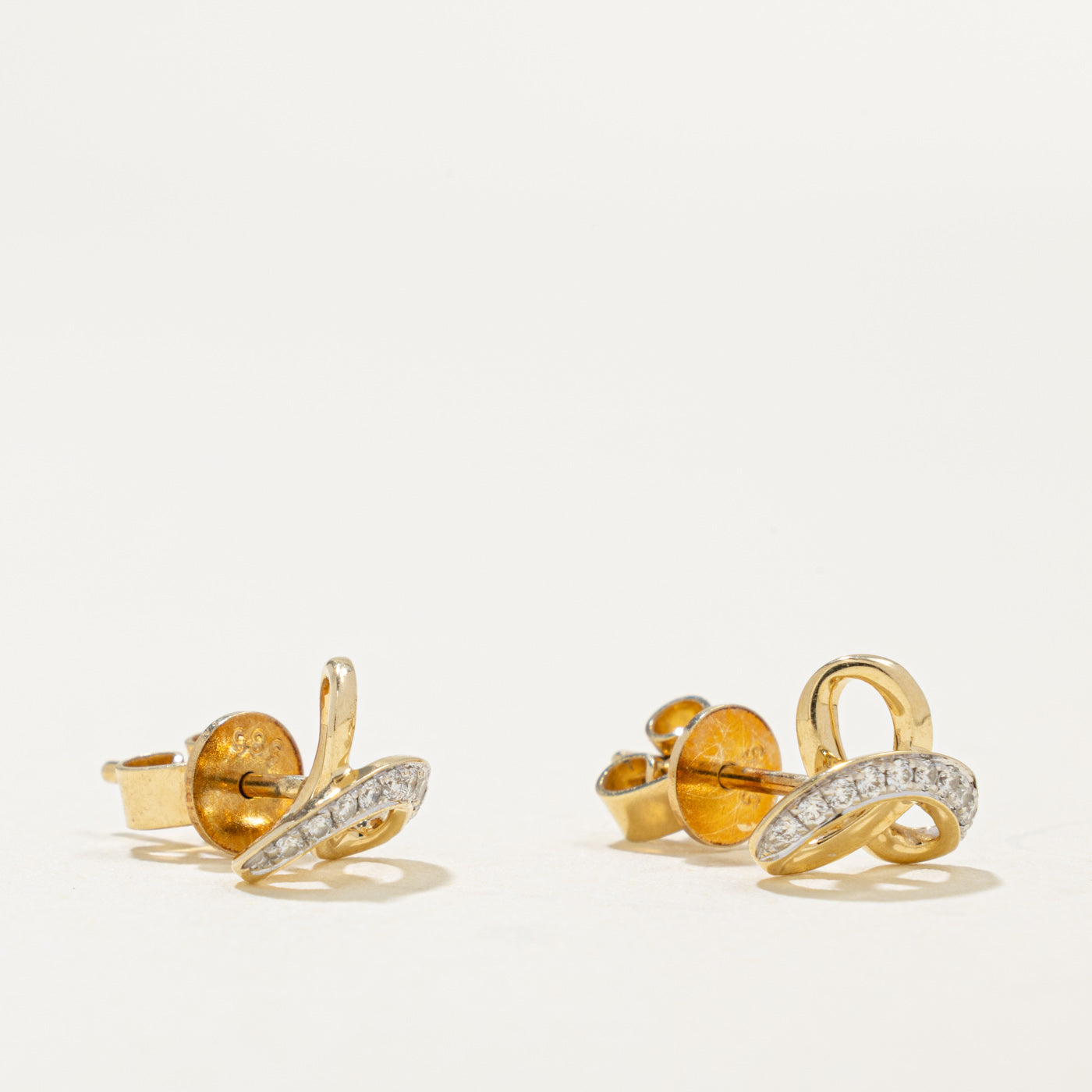 14k Diamond Accented Knot Stud Earrings | 0.10ctw