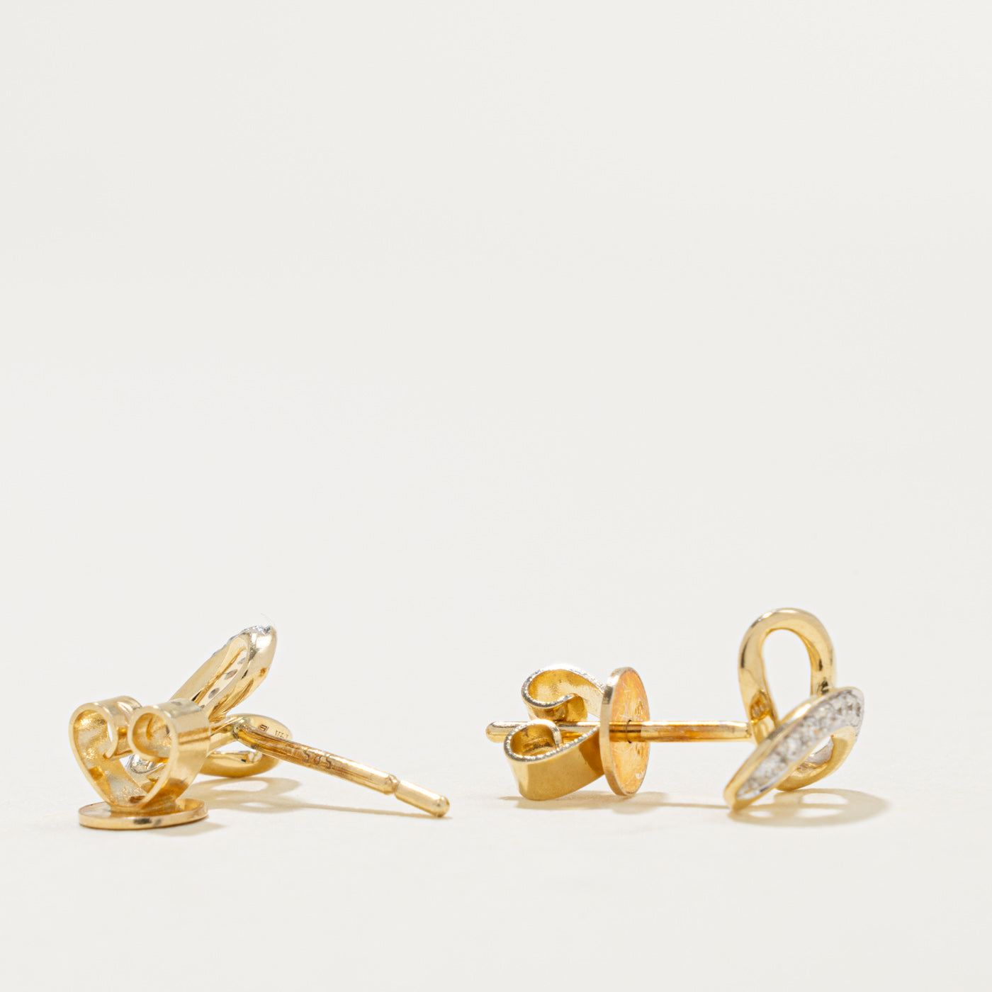 14k Diamond Accented Knot Stud Earrings | 0.10ctw