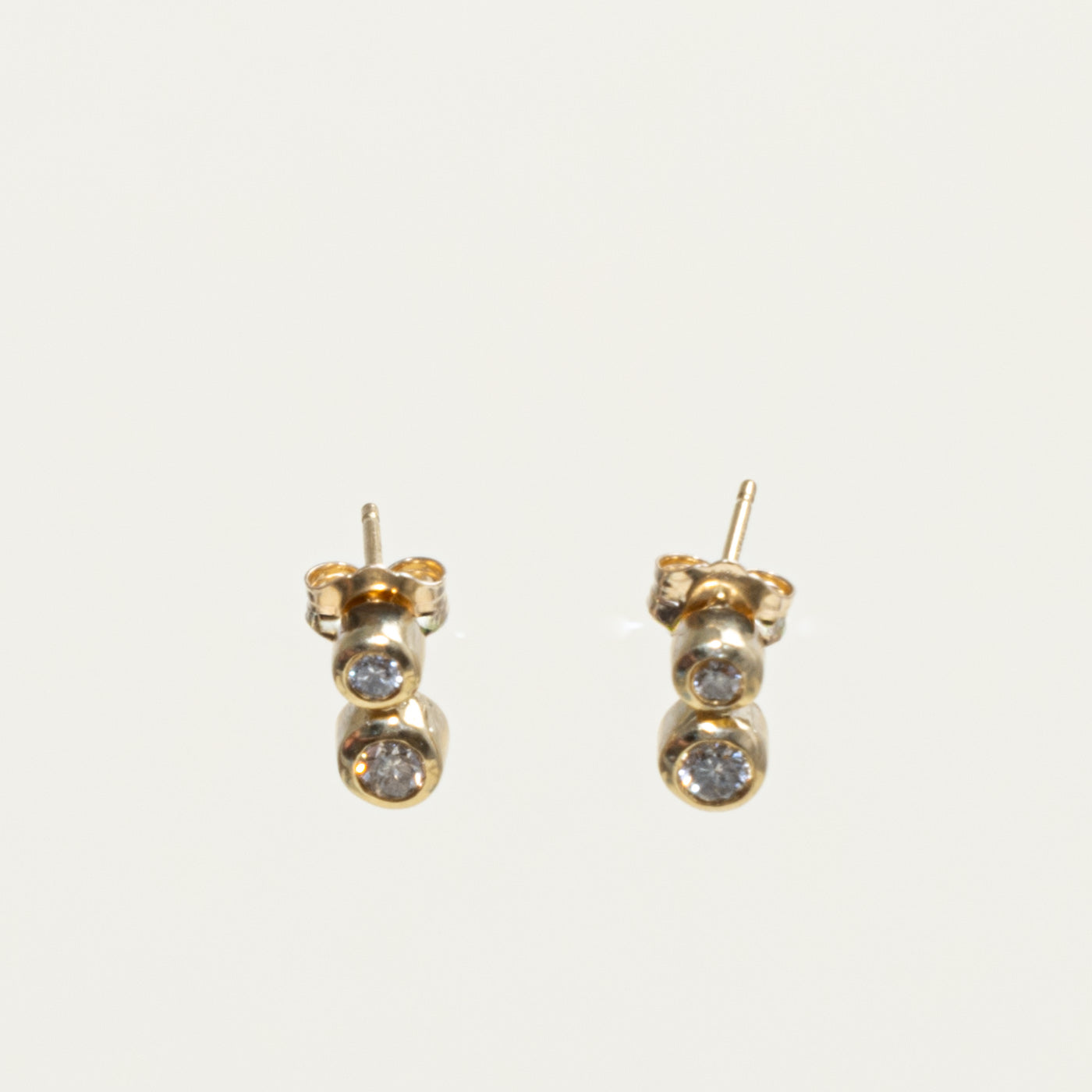 10k Bezel Set Two Stone Diamond Stud Earrings | 0.25ctw