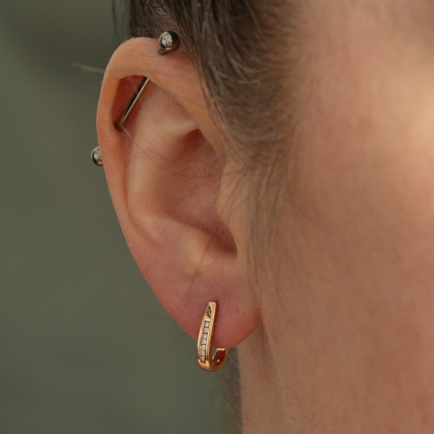 10k Channel Set Diamond Oval Hoop Earrings | 0.14ctw