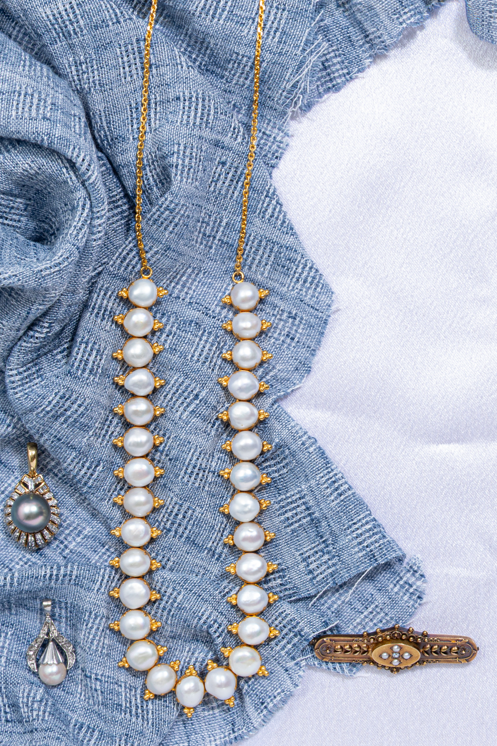 Preloved pearl jewellery collection with vintage freshwater pearl necklaces, heirloom pendants and antique brooch