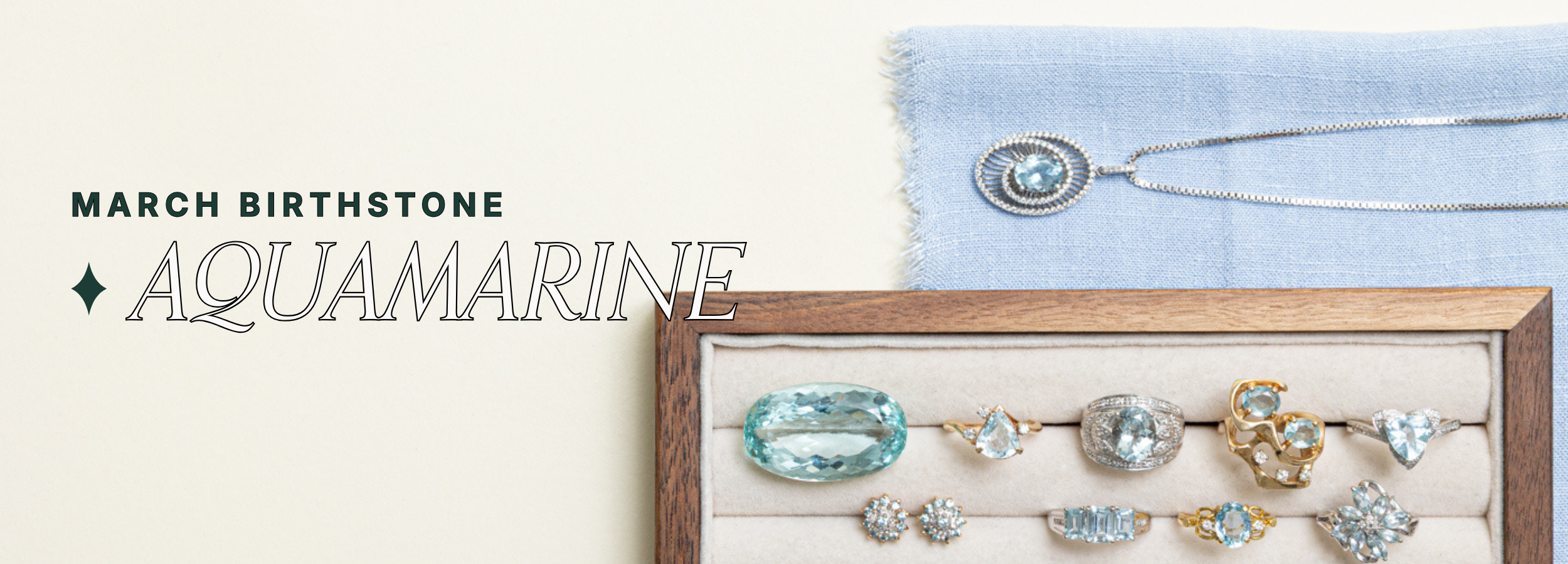 March birthstone aquamarine jewellery banner featuring vintage aquamarine rings, necklace, and gemstones