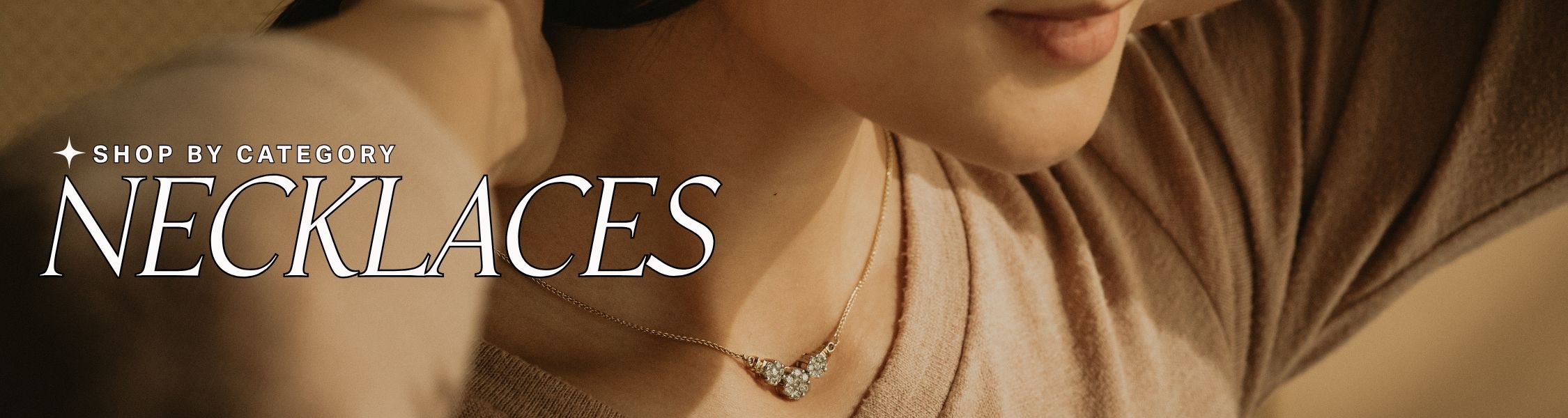 simple diamond Necklace on a woman with 'Shop by Category: Necklaces' text overlay