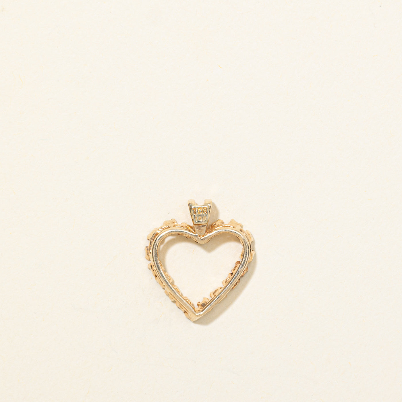 Pendentif cœur ouvert en or 14 carats et diamants