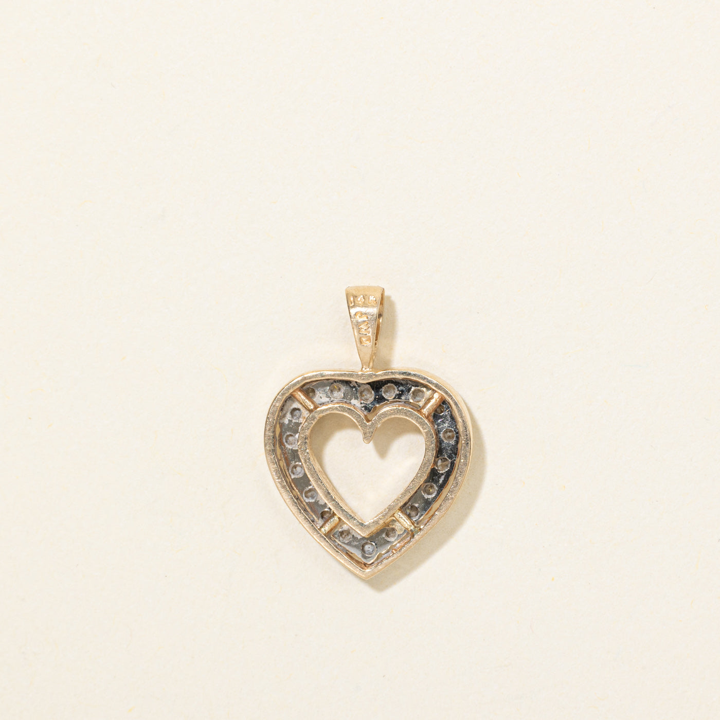 Pendentif cœur ouvert en or 14 carats et diamants
