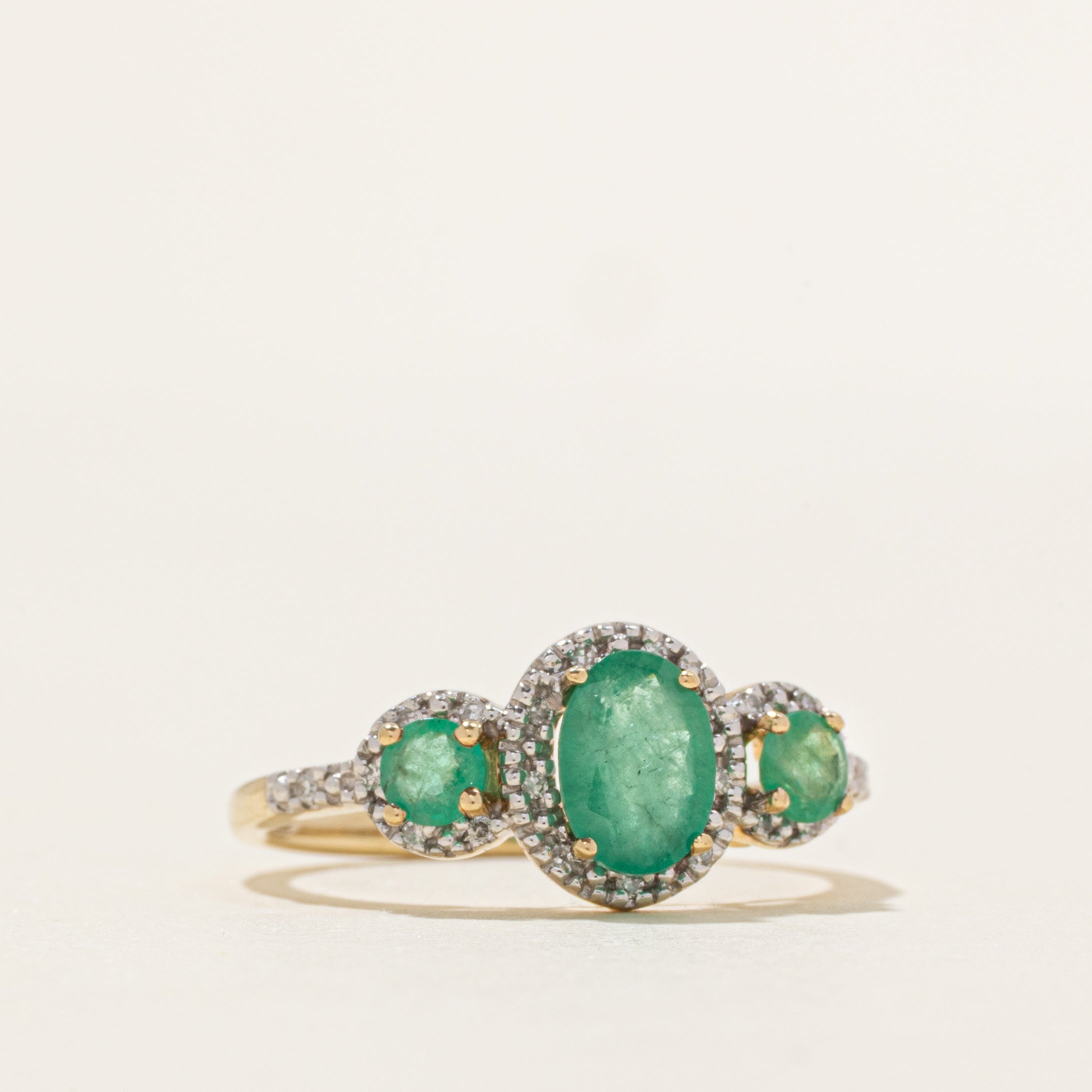 Three Stone Emerald & Diamond Halo Ring | 0.85ctw, 0.06ctw | SZ 7