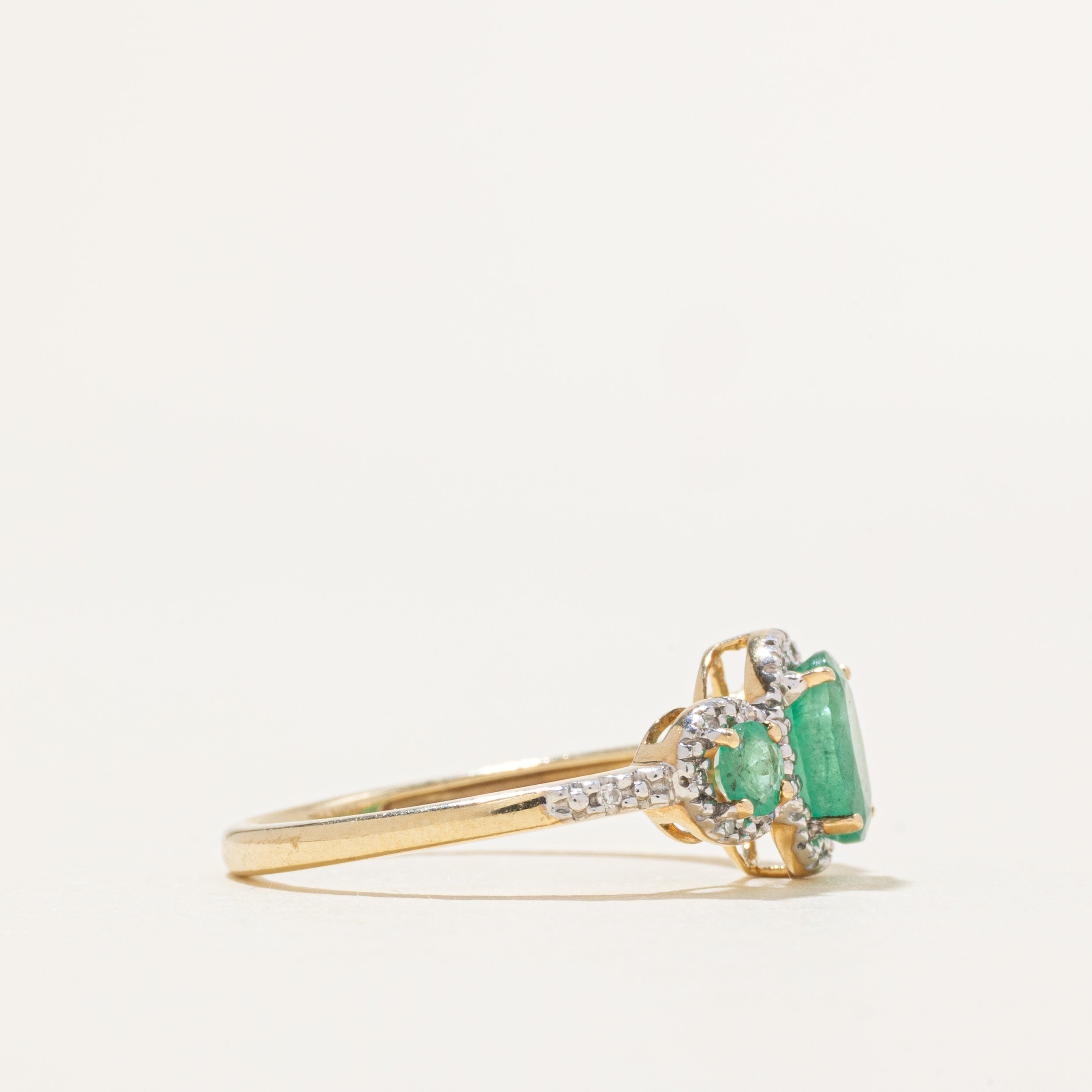 Three Stone Emerald & Diamond Halo Ring | 0.85ctw, 0.06ctw | SZ 7