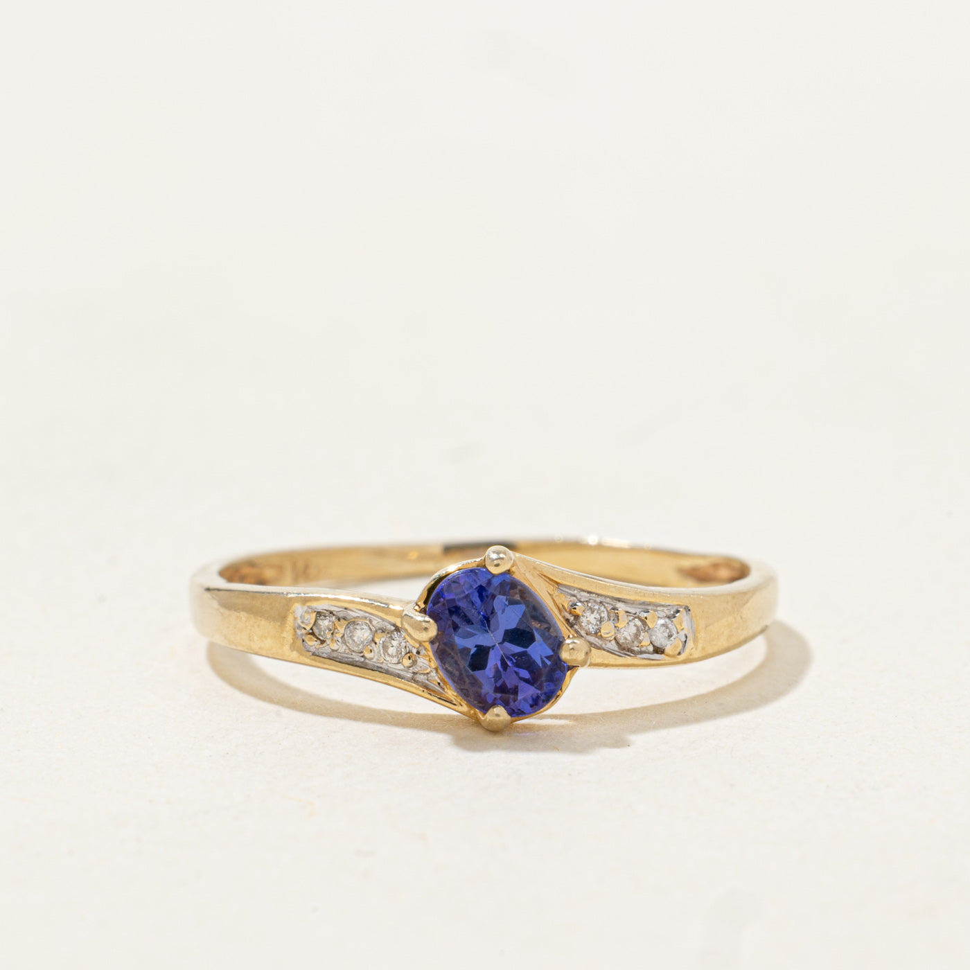 Oval Cut Tanzanite & Diamond Bypass Ring | 0.3ct, 0.03ctw | SZ 6.75 |