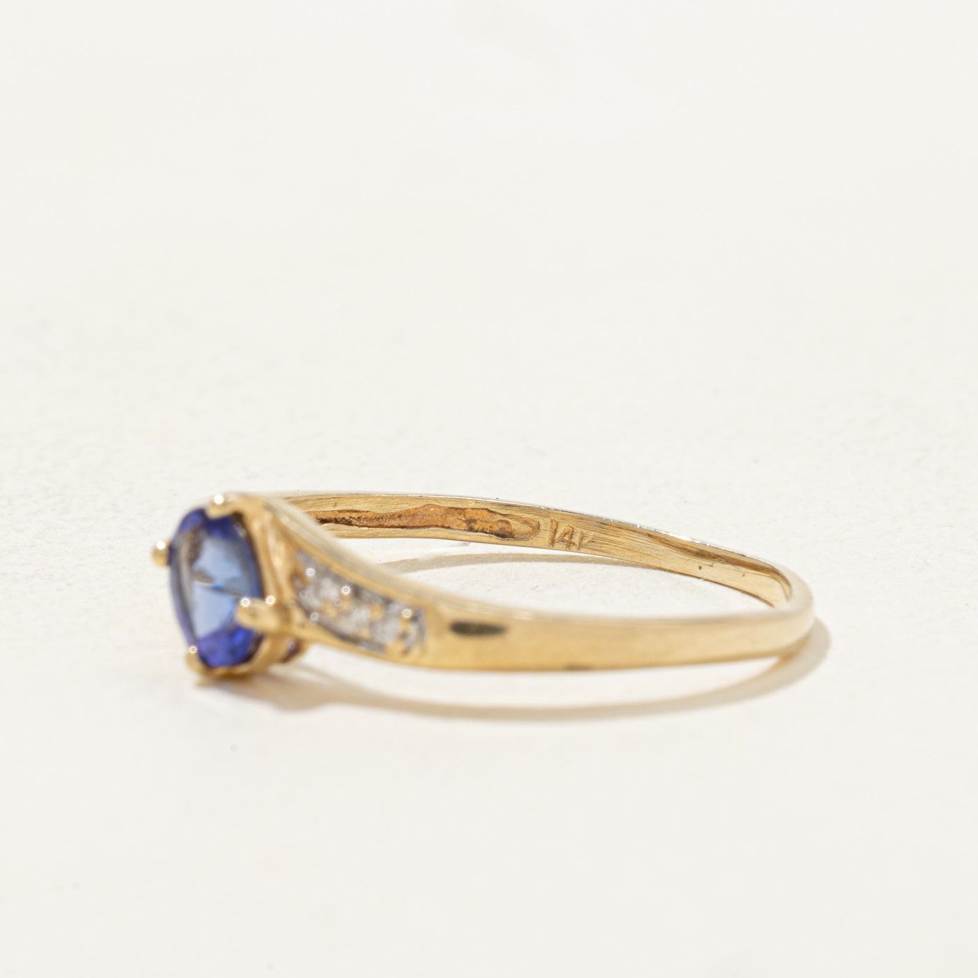 Oval Cut Tanzanite & Diamond Bypass Ring | 0.3ct, 0.03ctw | SZ 6.75 |
