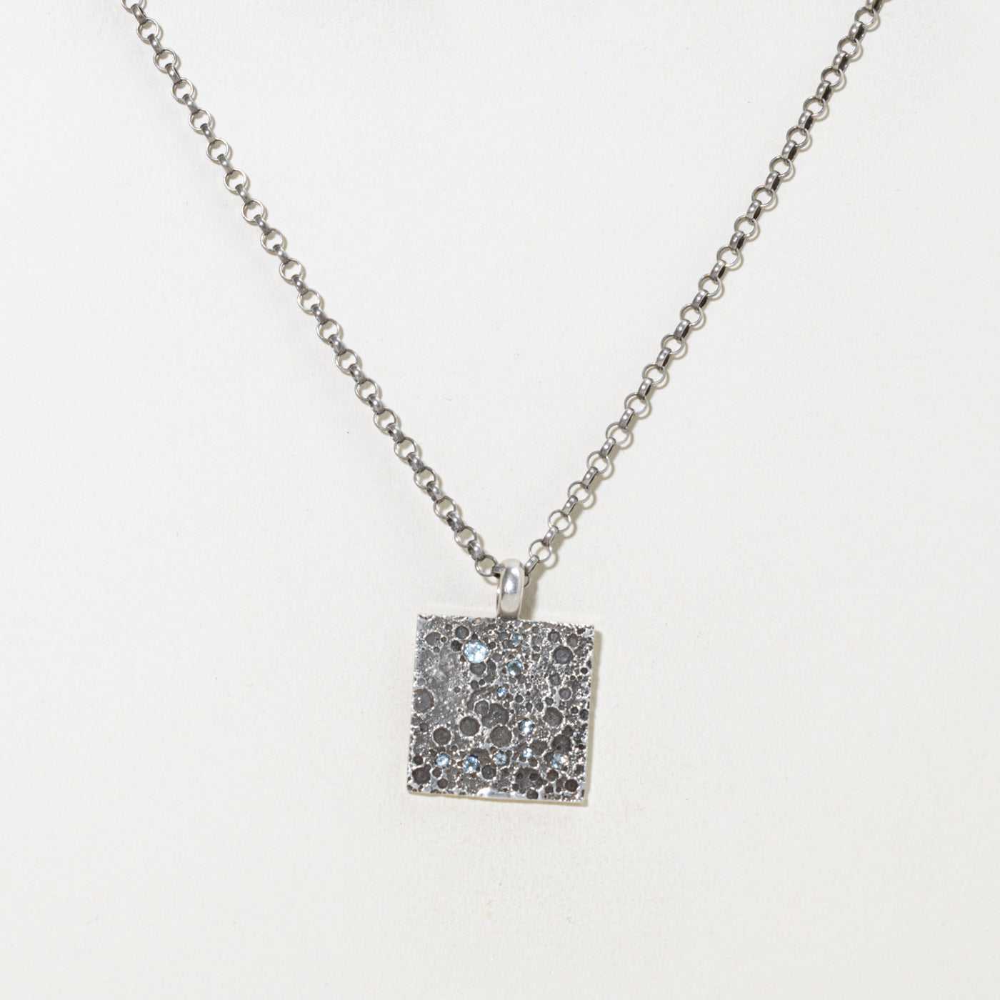 Sterling Silver Blue Topaz Pisces Pendant Necklace | 0.25ctw | 22.5"