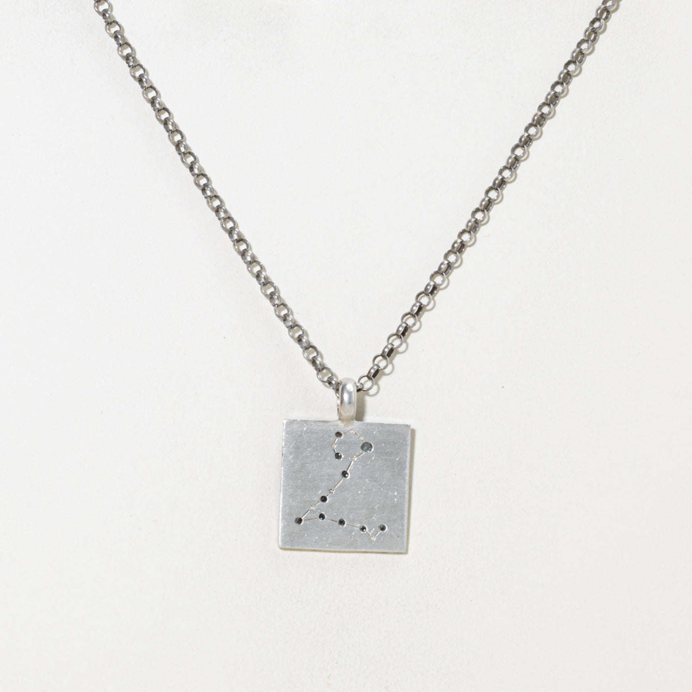 Sterling Silver Blue Topaz Pisces Pendant Necklace | 0.25ctw | 22.5"