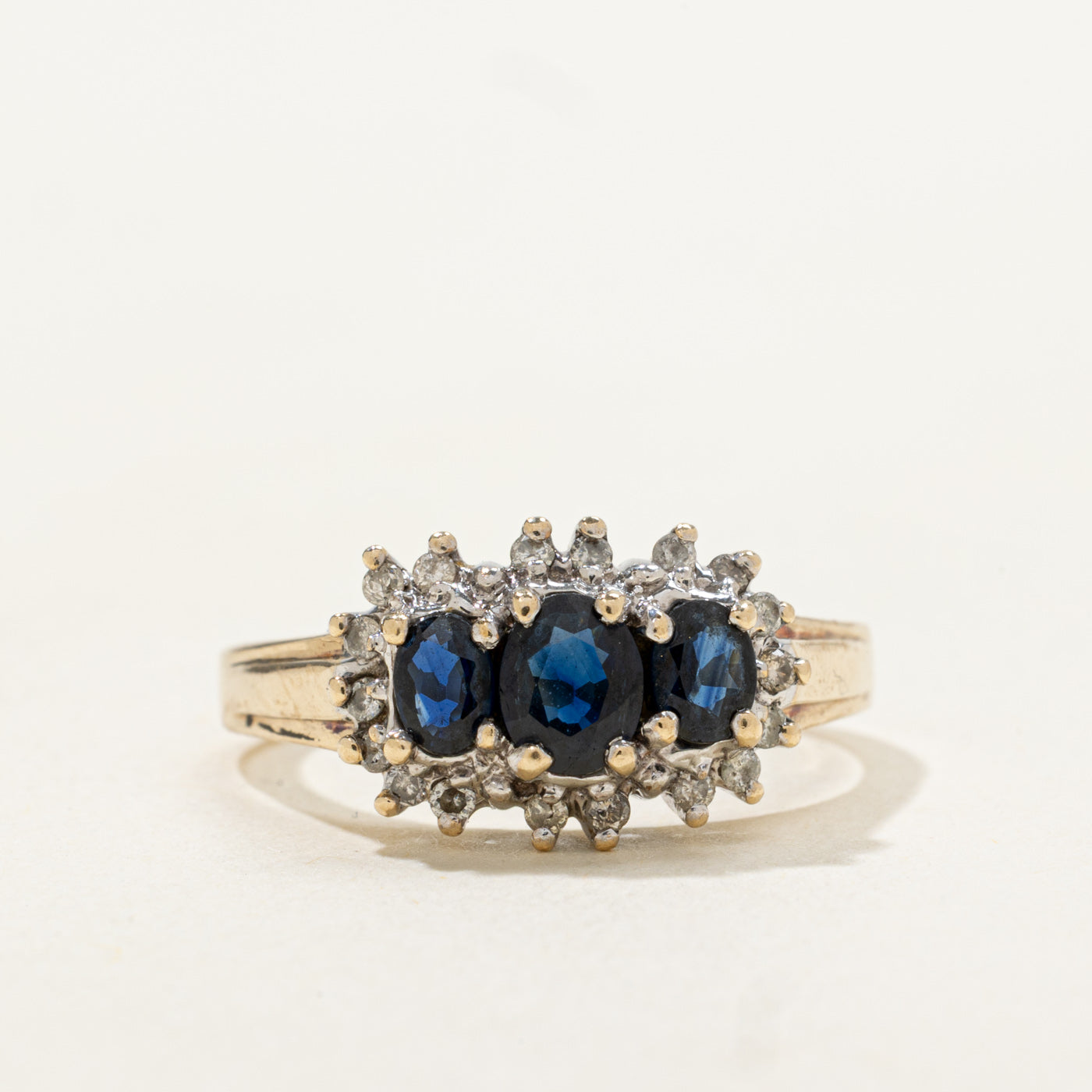 Three Stone Sapphire & Diamond Petal Halo Ring | 0.62ctw, 0.09ctw | SZ 6.5 |