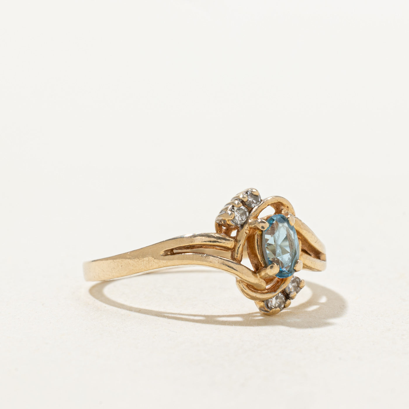 Blue Topaz & Diamond Openwork Bypass Ring | 0.25ct, 0.04ctw | SZ 6.0 |