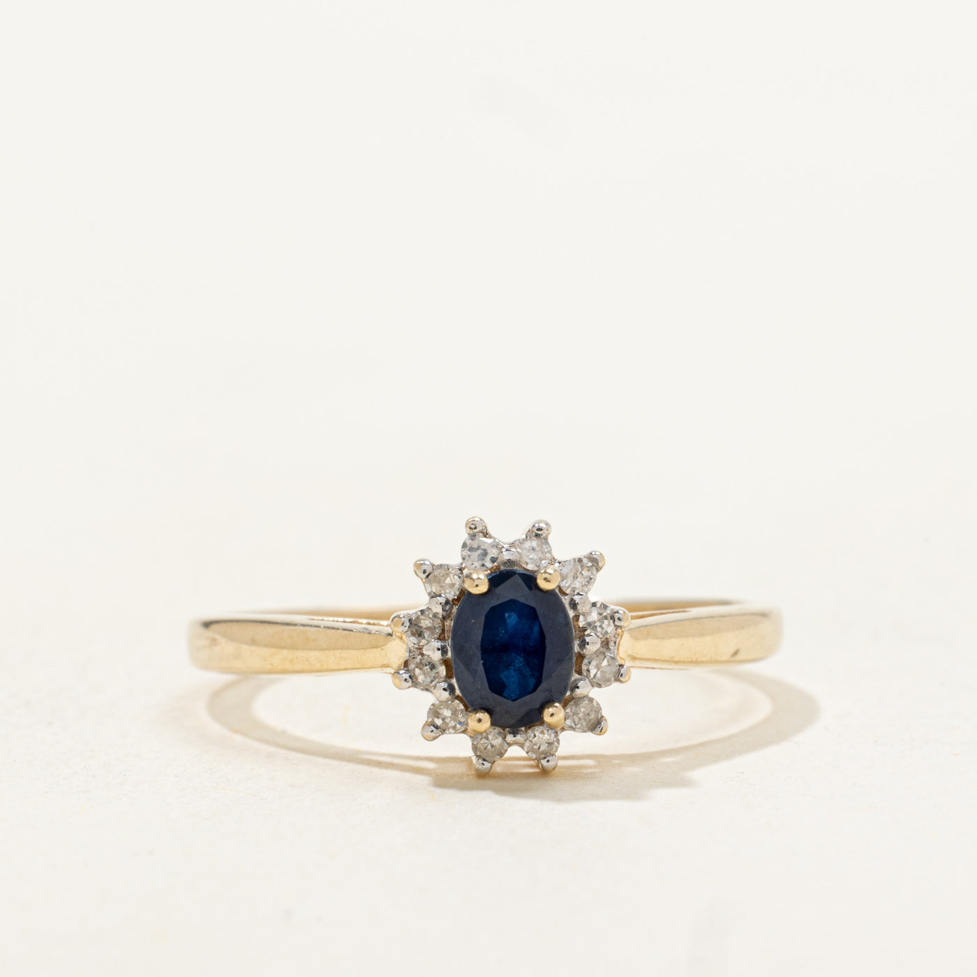 Oval Cut Sapphire & Diamond Petal Halo Ring | 0.41ct, 0.06ctw | SZ 8.25 |